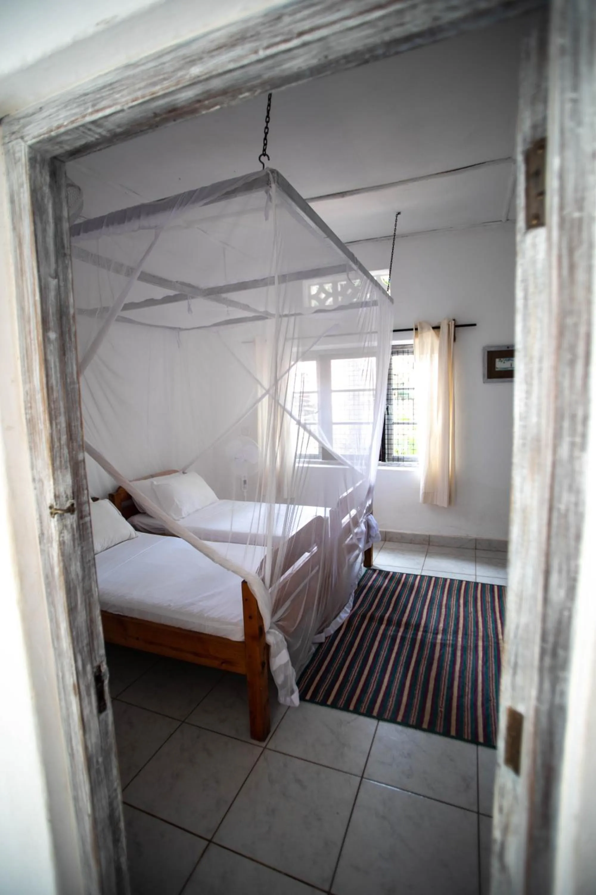 Bed in Flamboyant Diani Beach