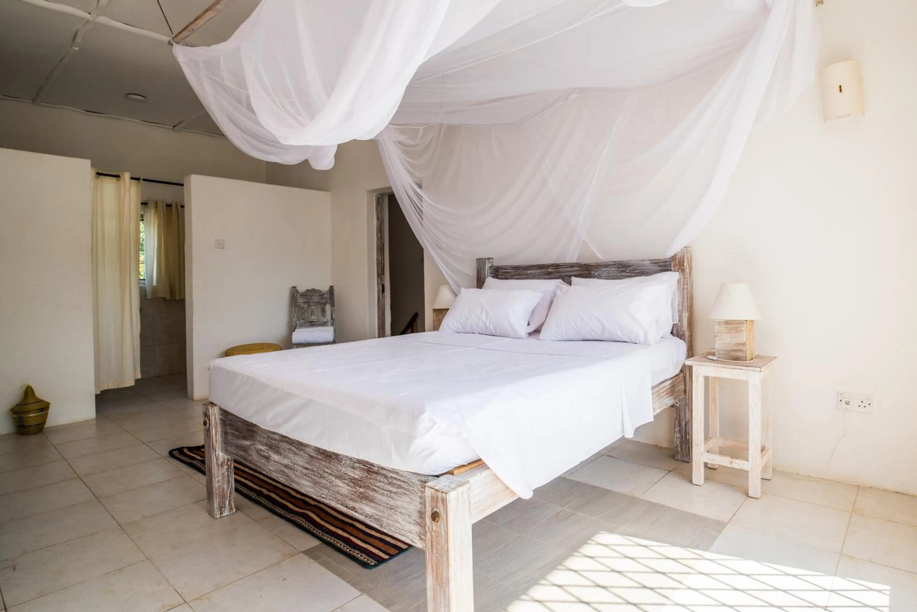 Bed in Flamboyant Diani Beach
