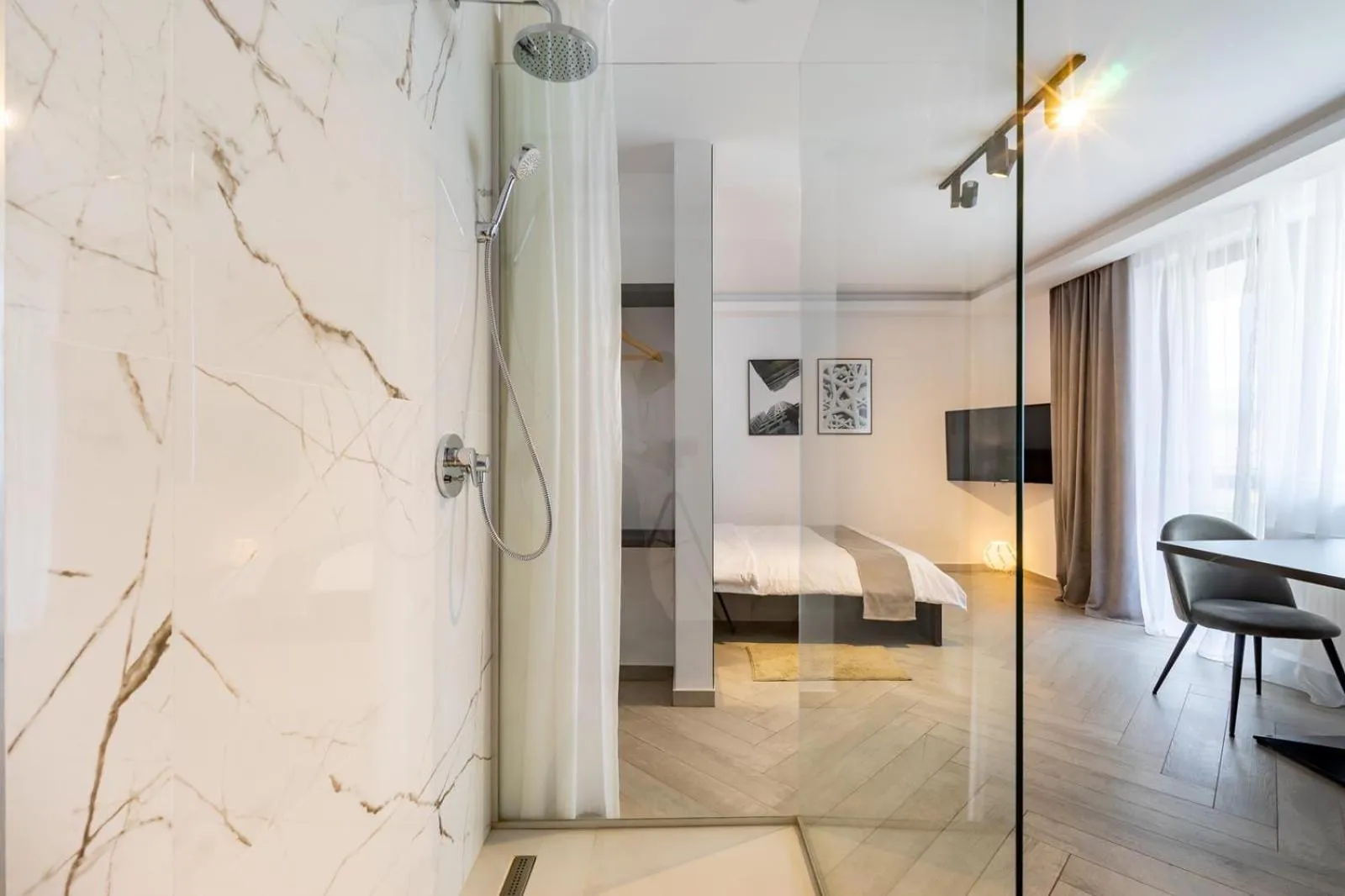 Shower, Bed in Urbio Private Suites
