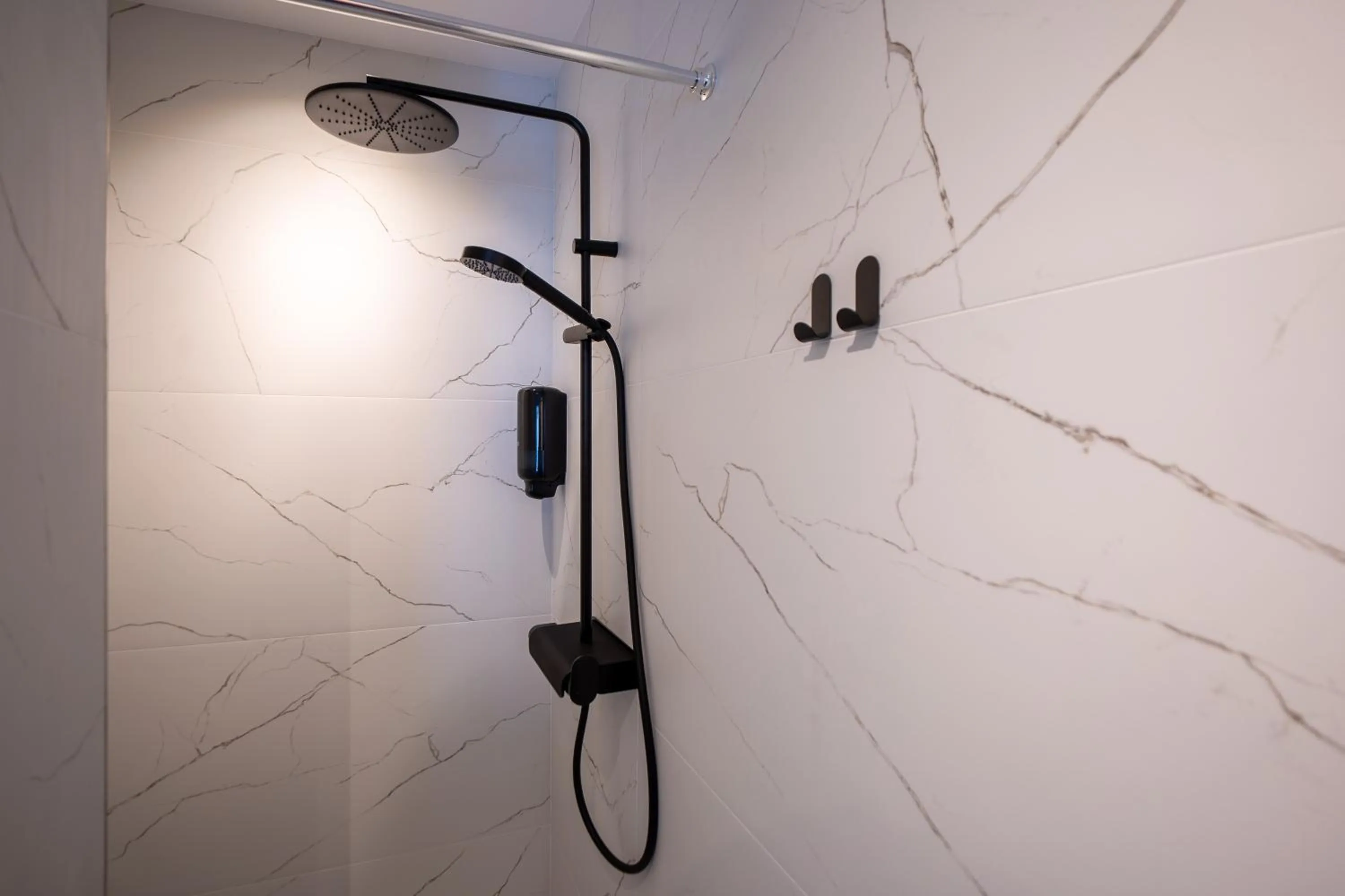 Shower in Urbio Private Suites