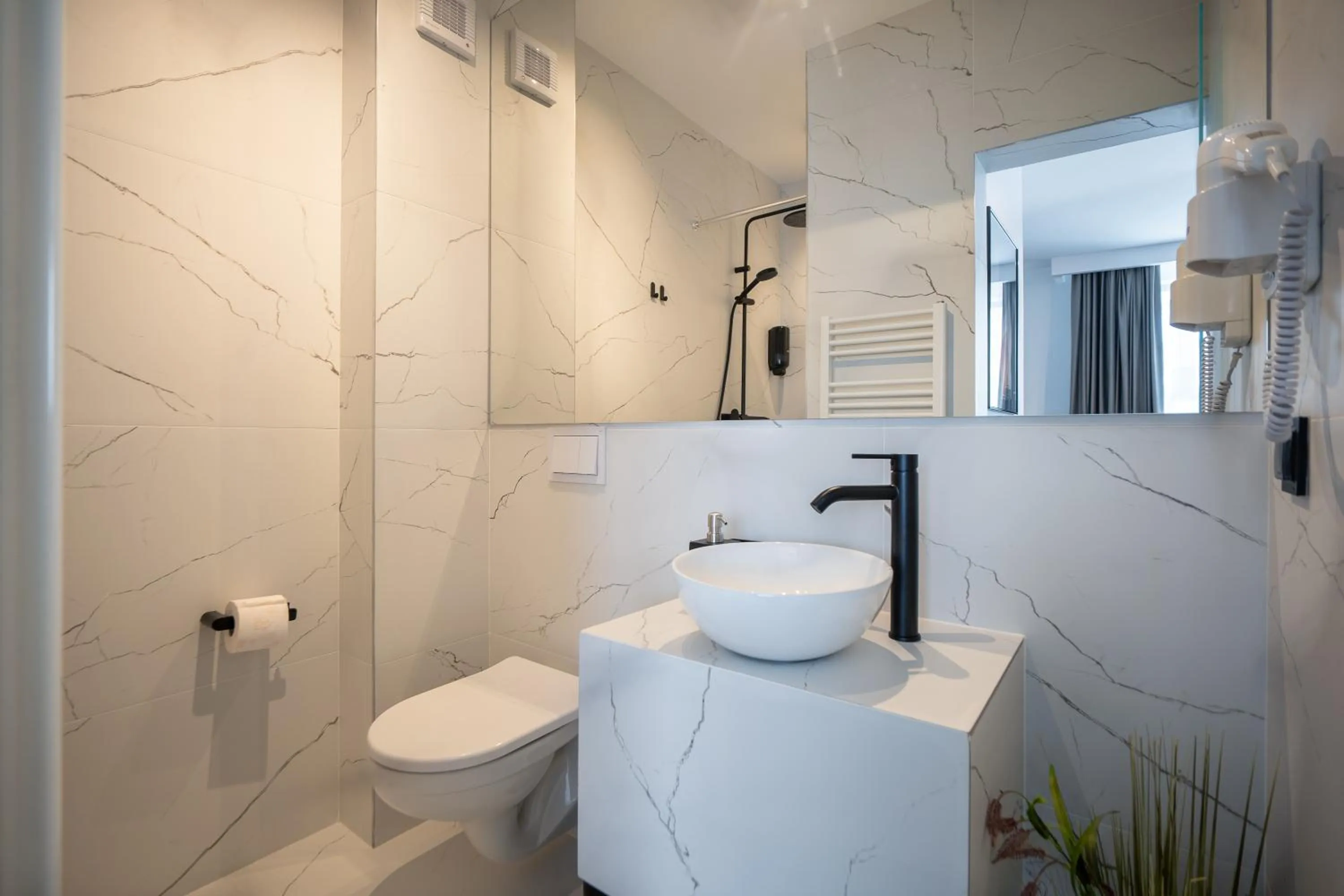 Toilet in Urbio Private Suites