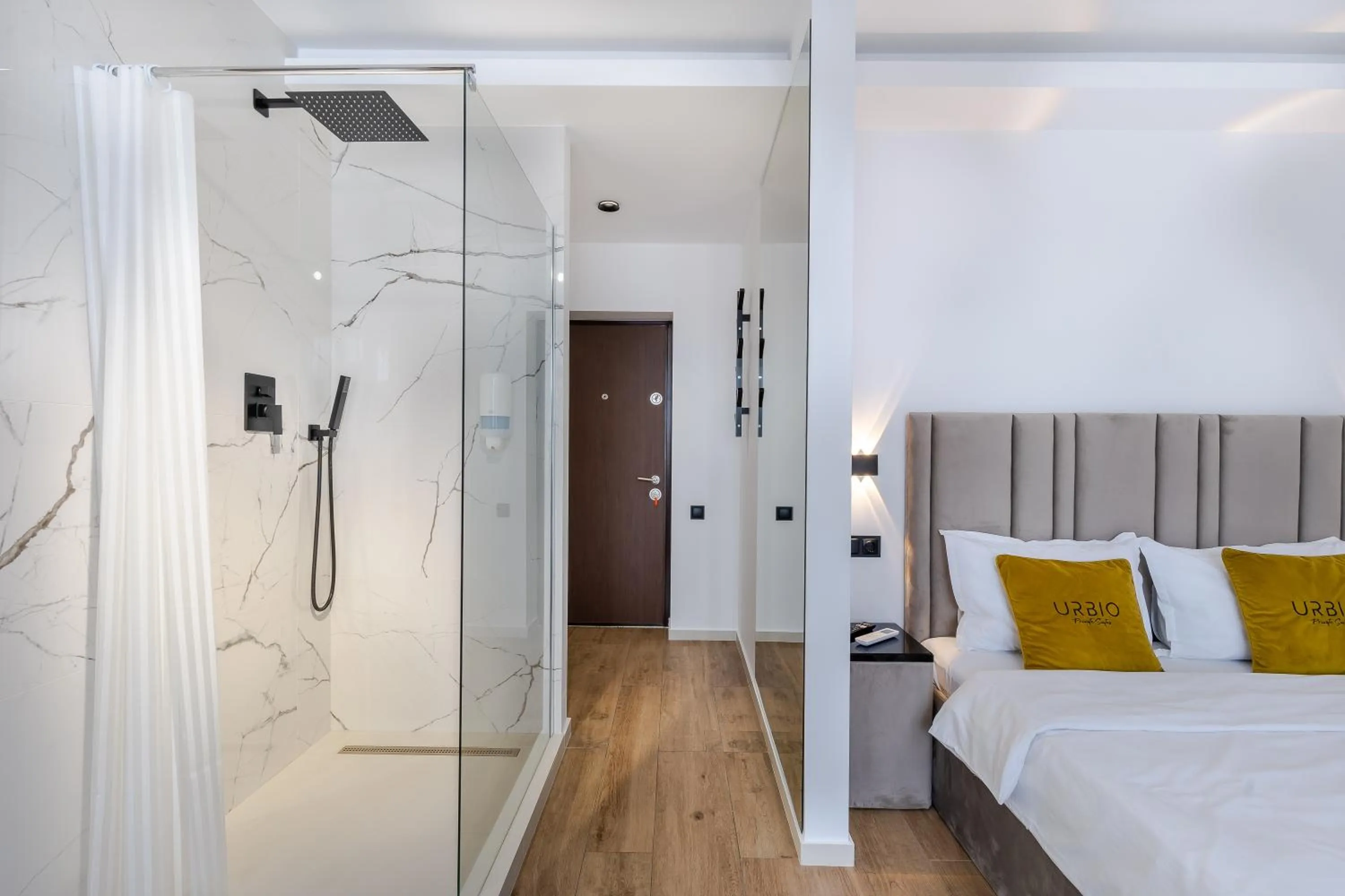 Shower, Bed in Urbio Private Suites