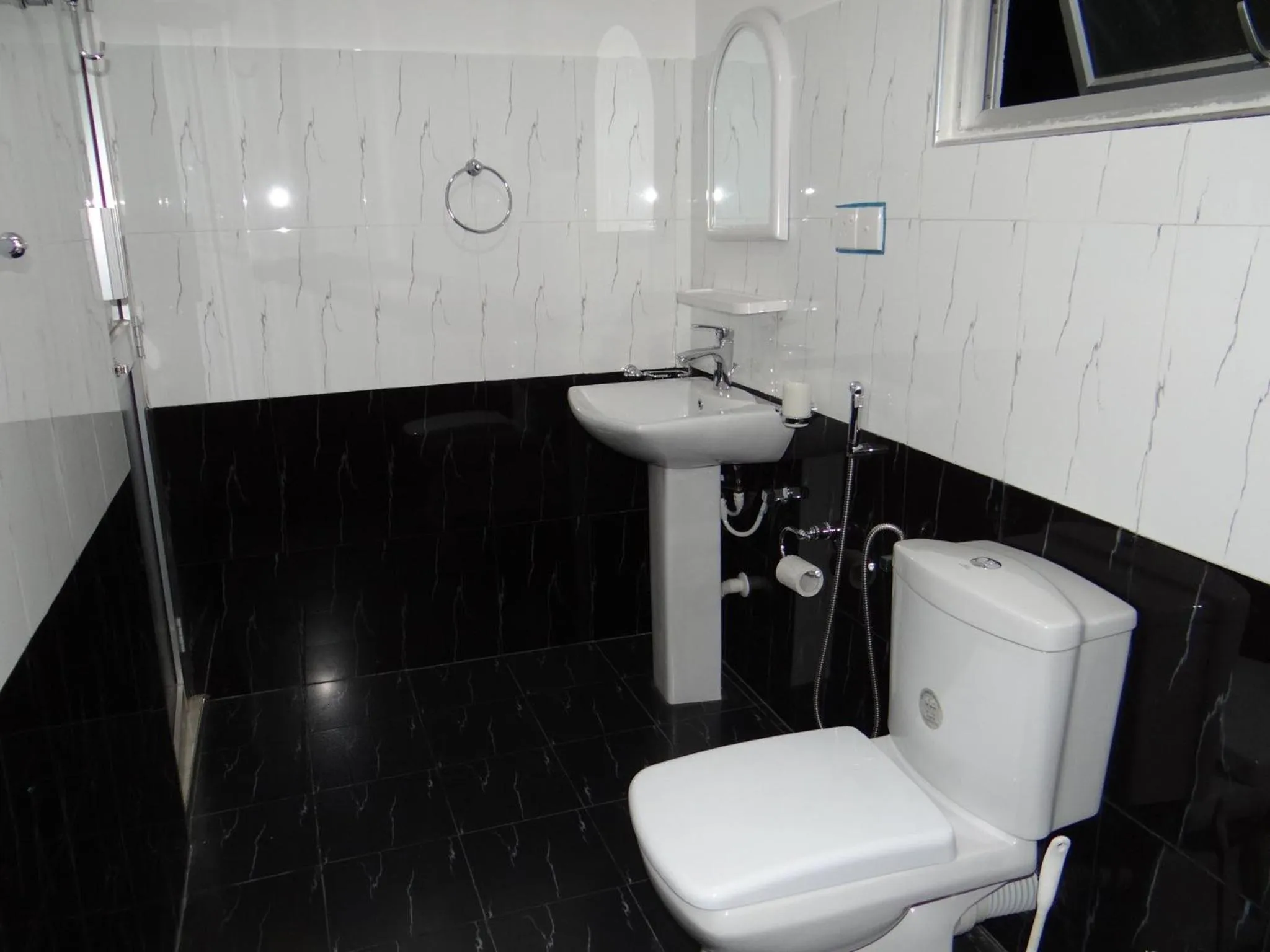 Bathroom in New Rani Inn