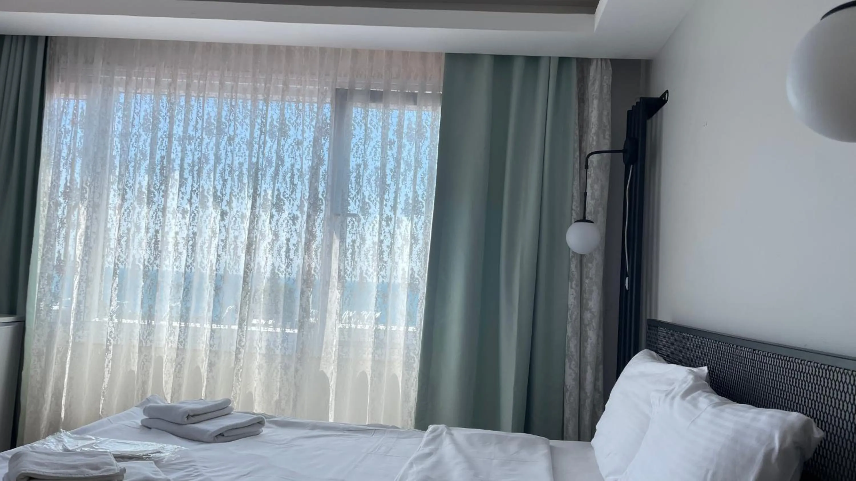 Bed in Ora Bella Hotel