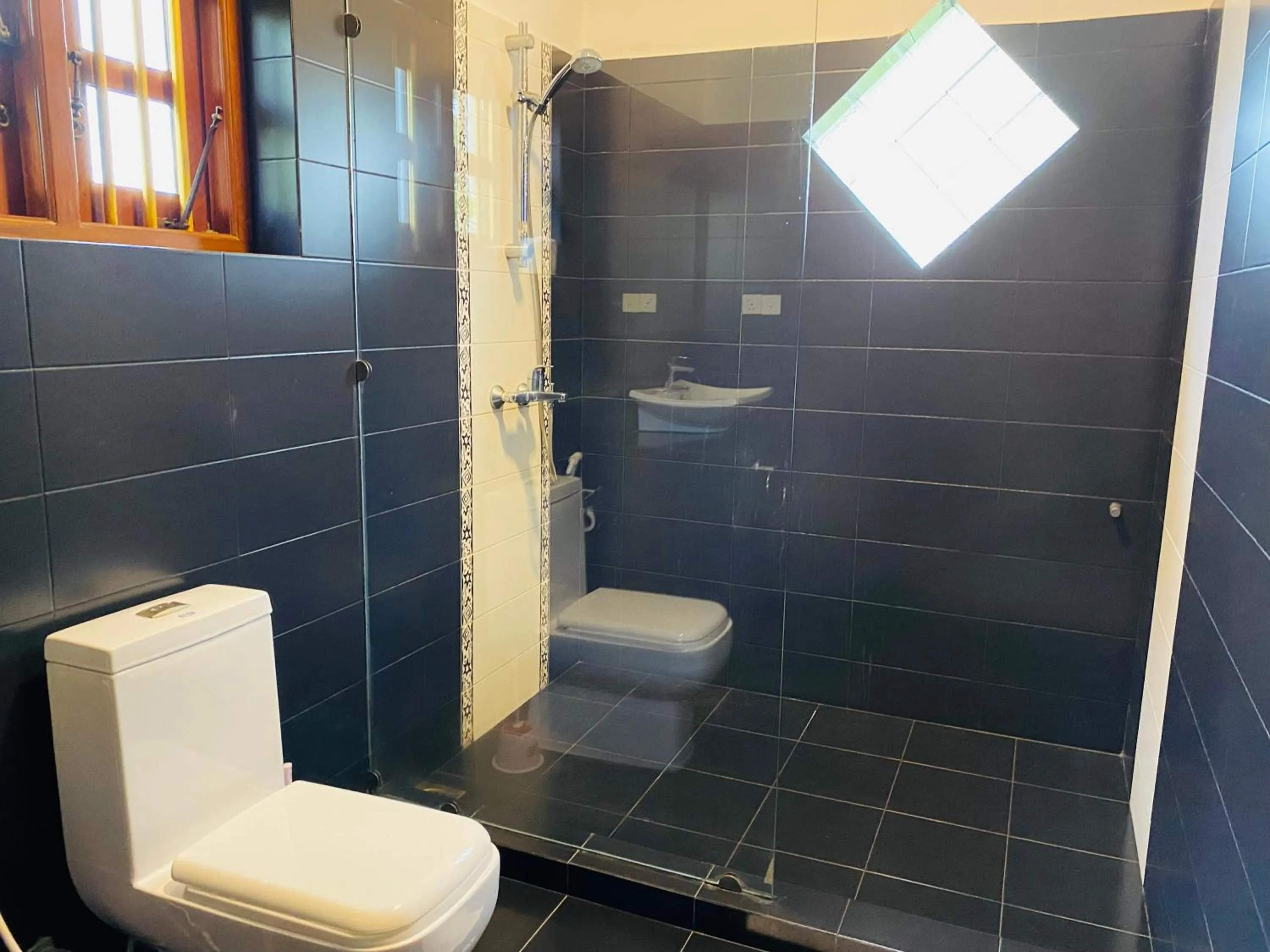 Bathroom in Sagarika Beach Hotel