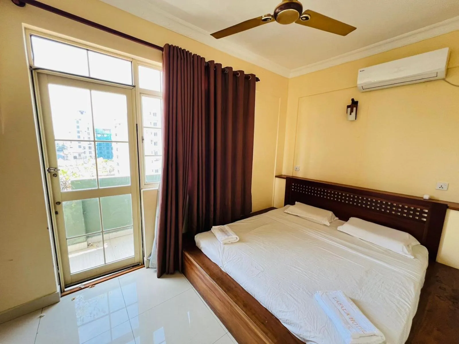 Bed in Lafala Hotel & Service Apartment