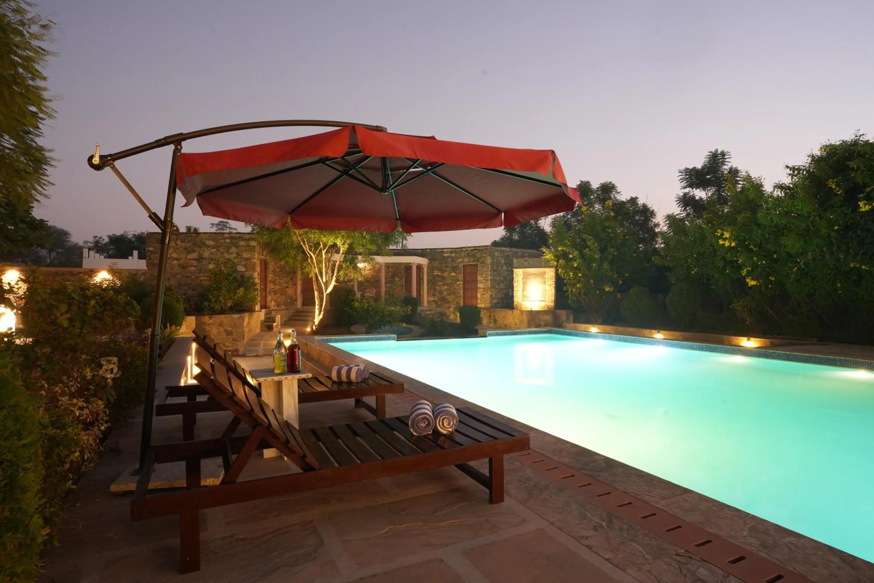 Swimming pool in Astroport Sariska Treetop by Eight Continents