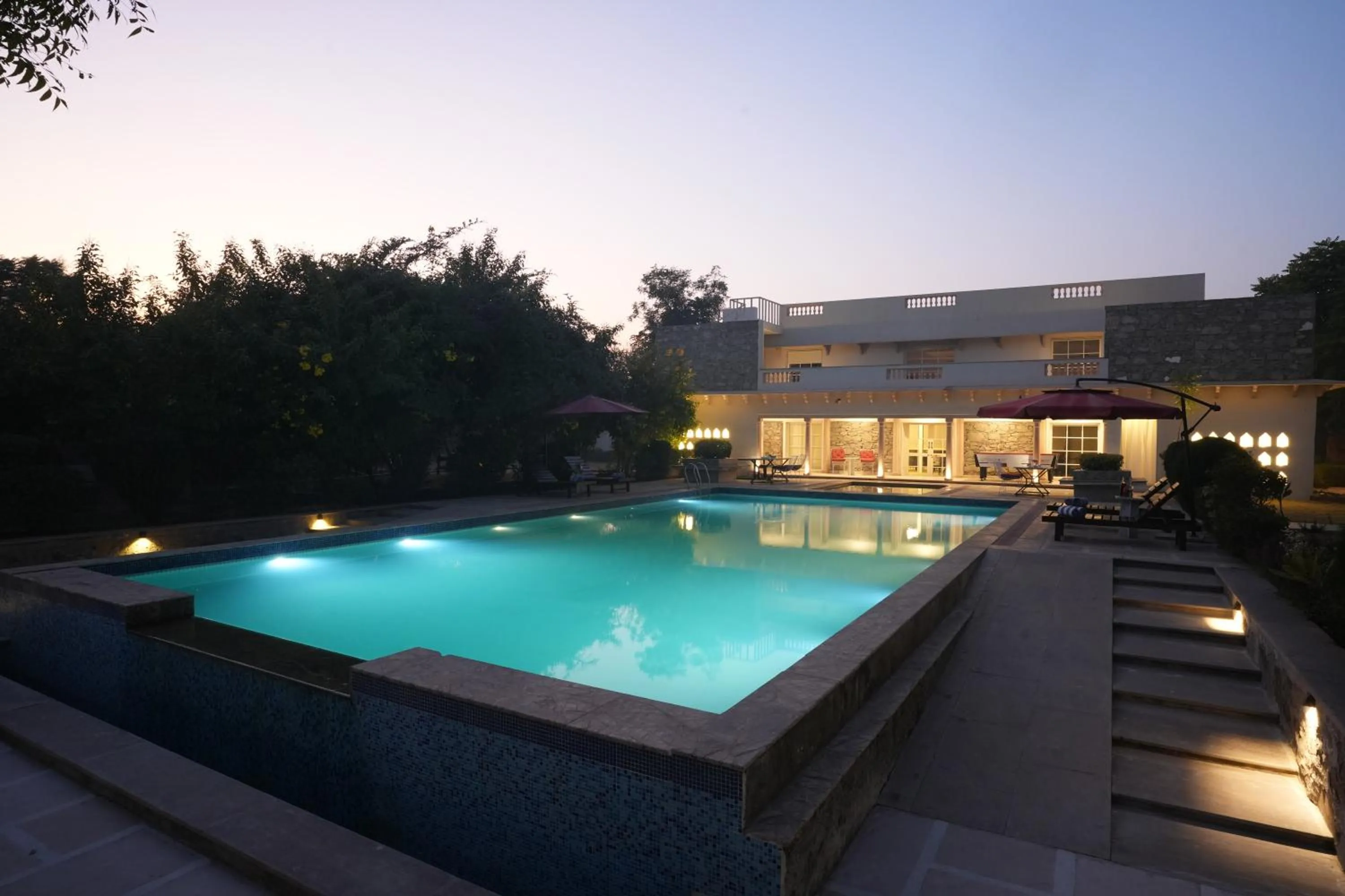 Swimming pool in Astroport Sariska Treetop by Eight Continents