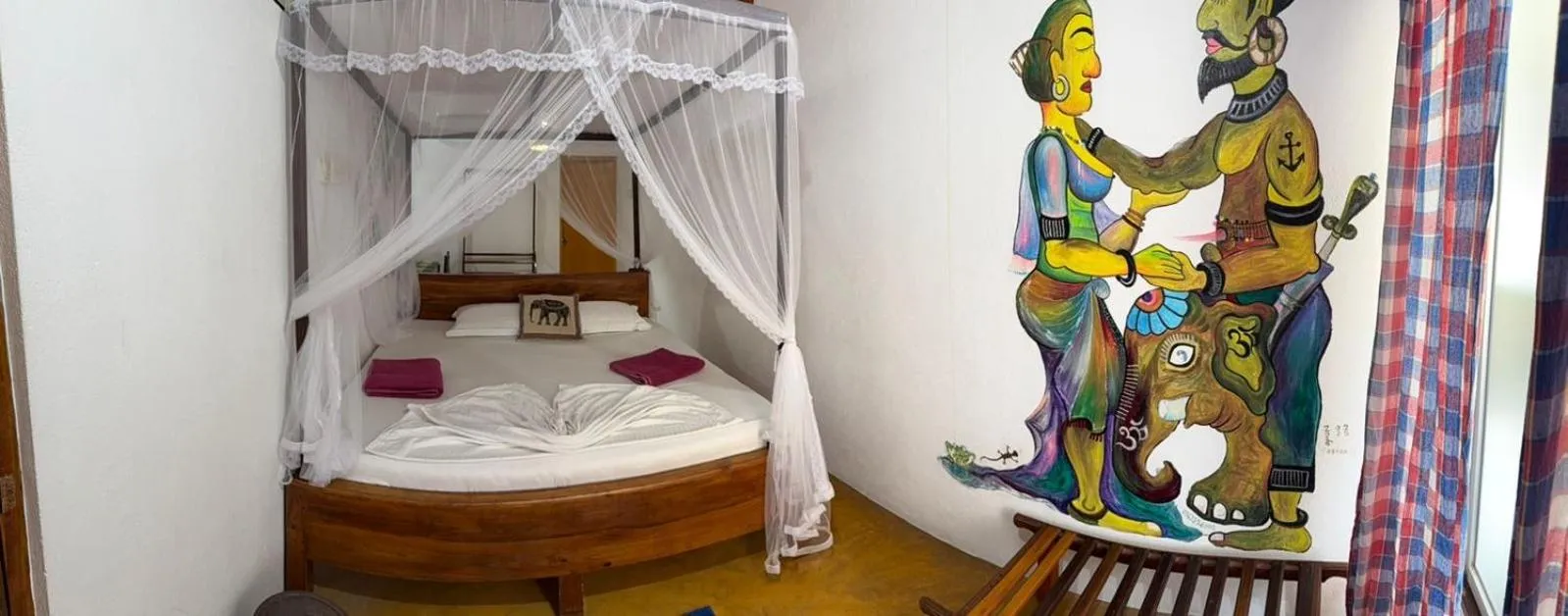 Bed in Frangipani Beach Villa