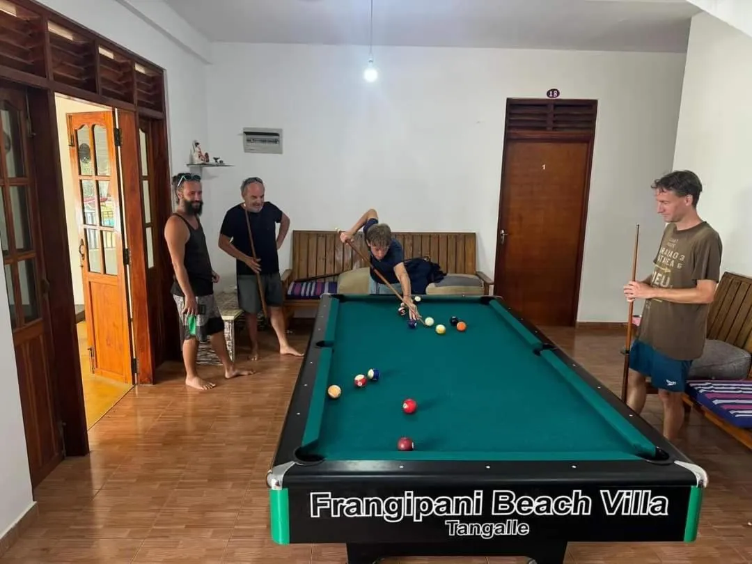 People in Frangipani Beach Villa