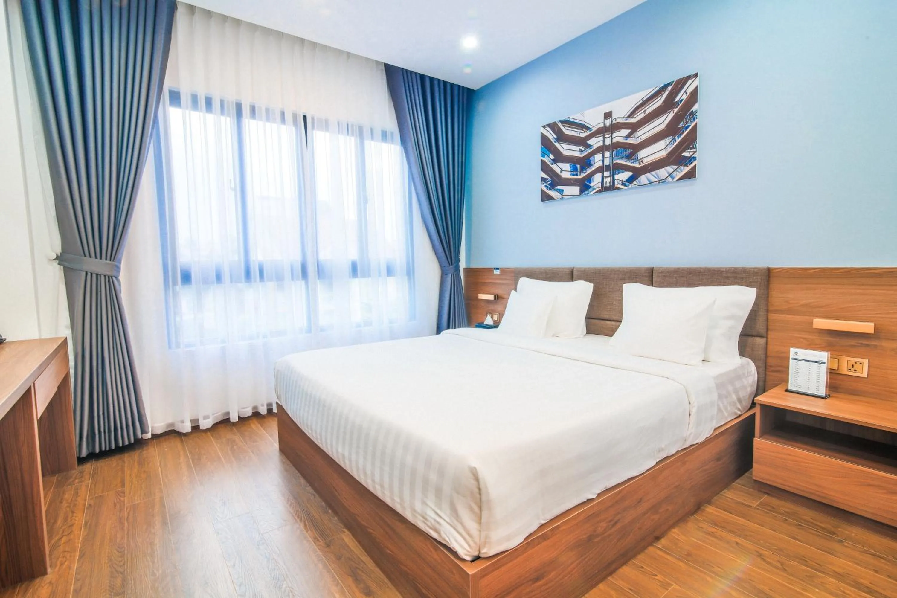 Bed in Grand Lee Hotel