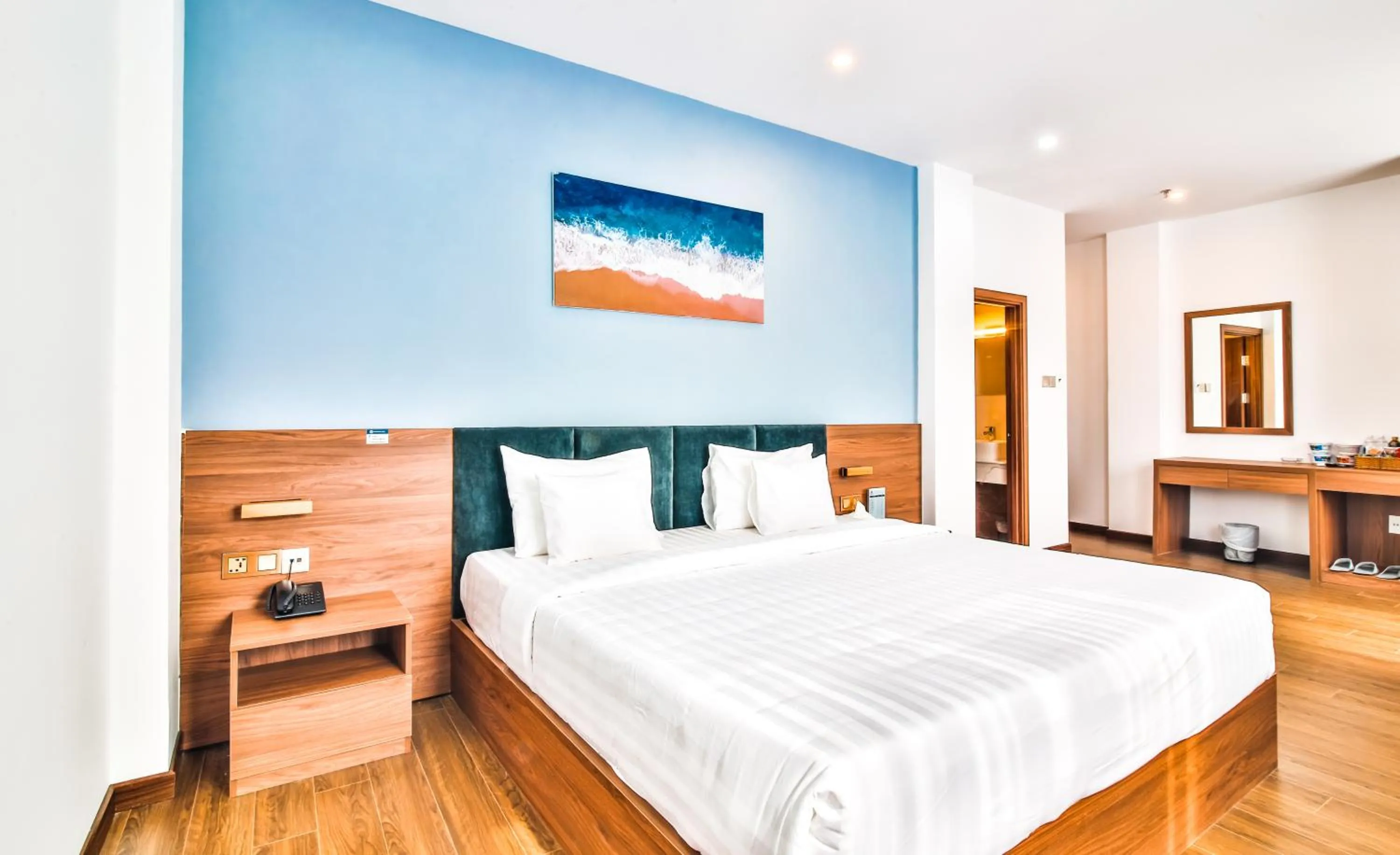 Bed in Grand Lee Hotel