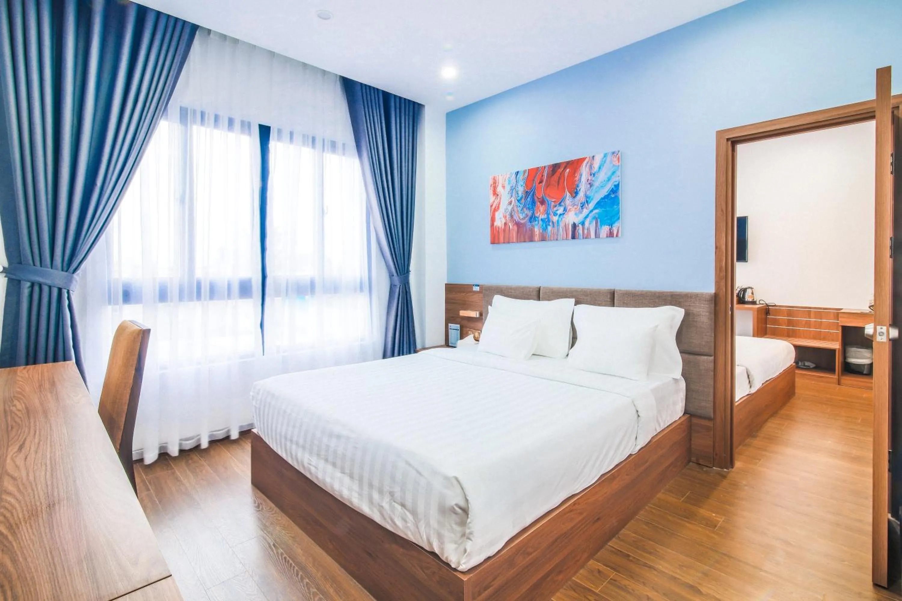 Bed in Grand Lee Hotel