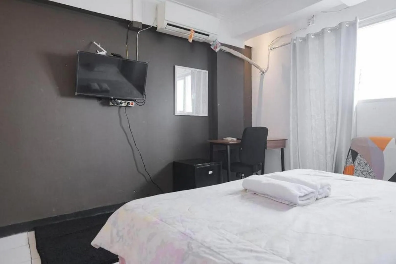 TV and multimedia in Apartemen Sentra Timur Residence - Cheap Inn Tower Orange