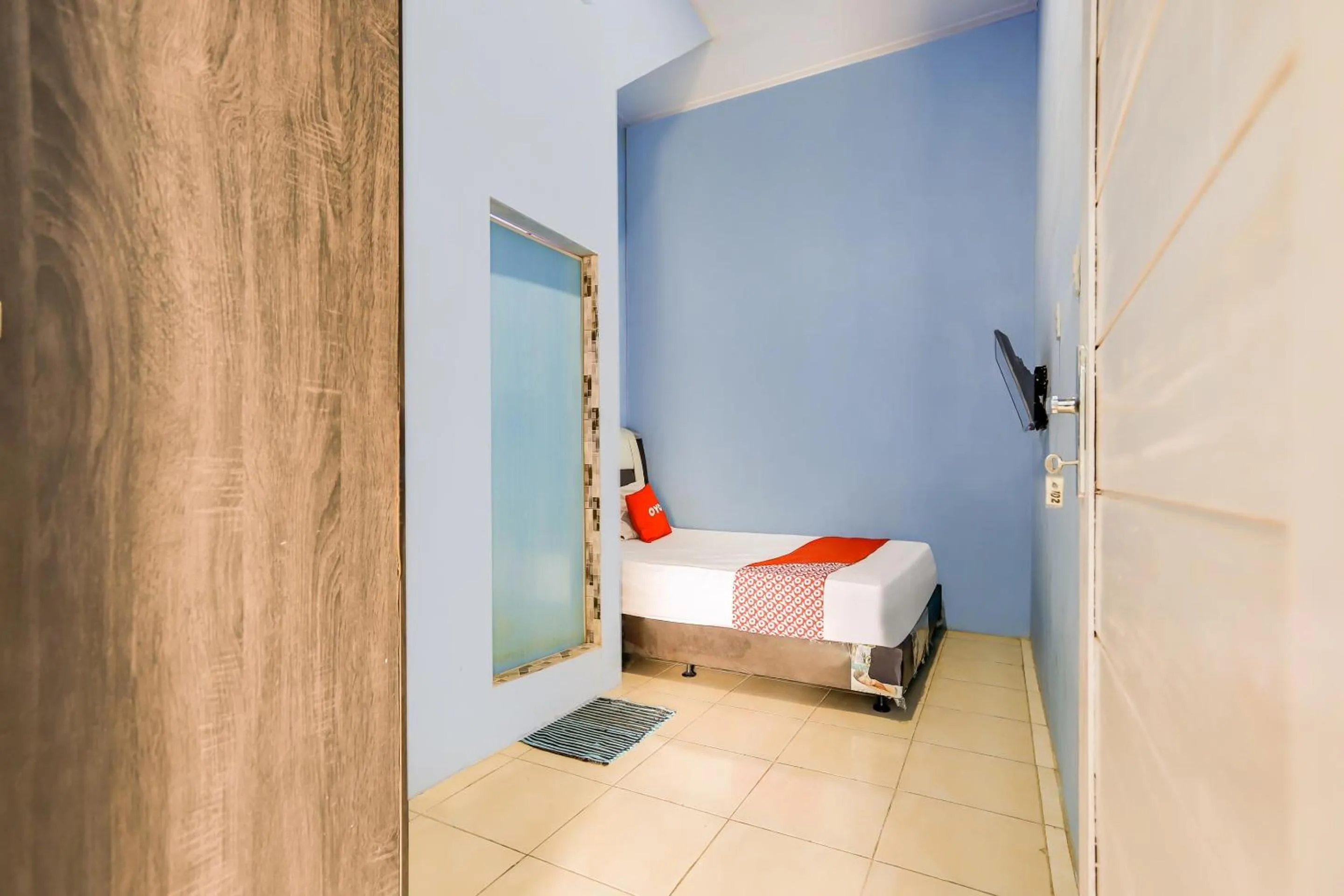 Bedroom, Bed in Hotel O Faster Inn 1