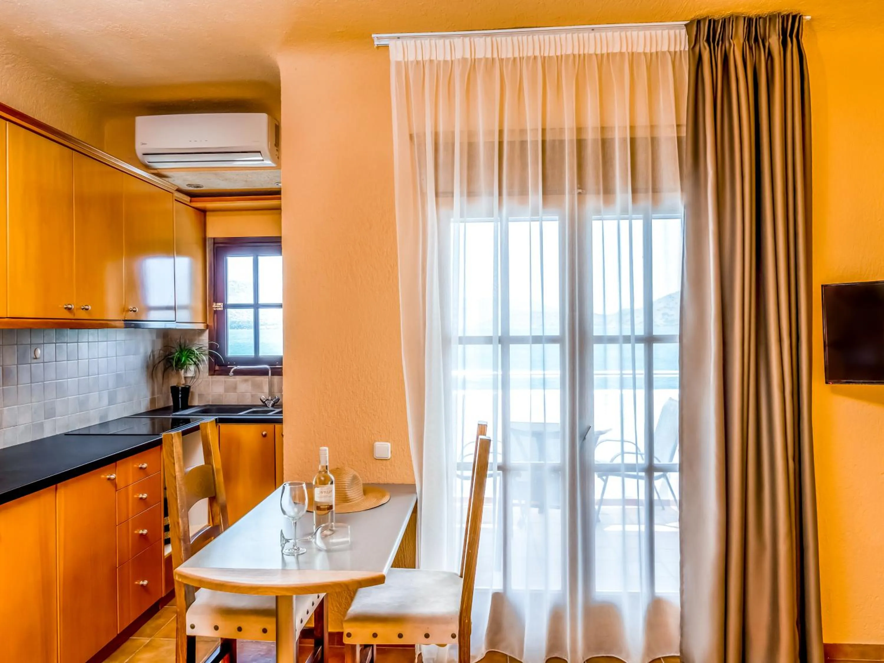 Kitchen or kitchenette in Elounda Alikes Suites & Studios