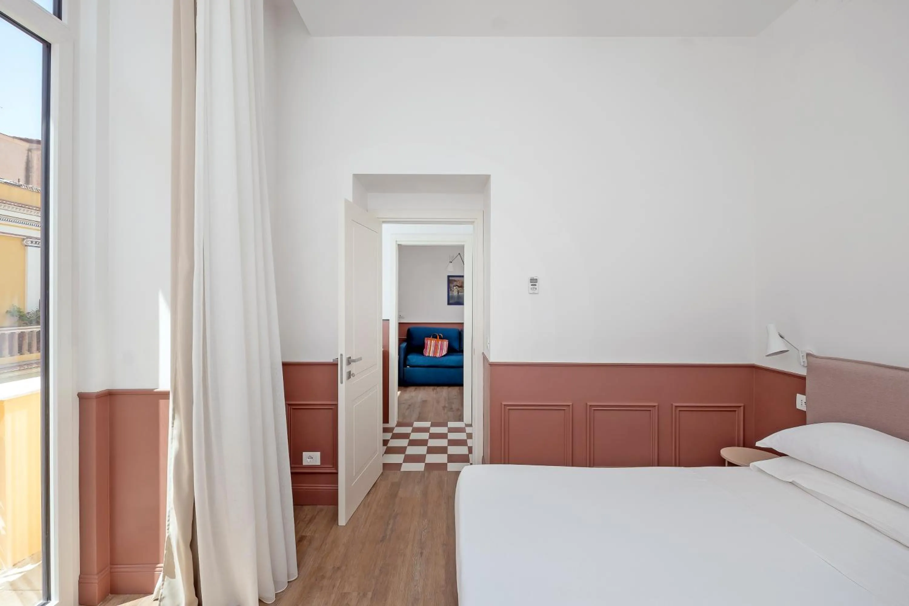 Bed in Corso Italia Suites