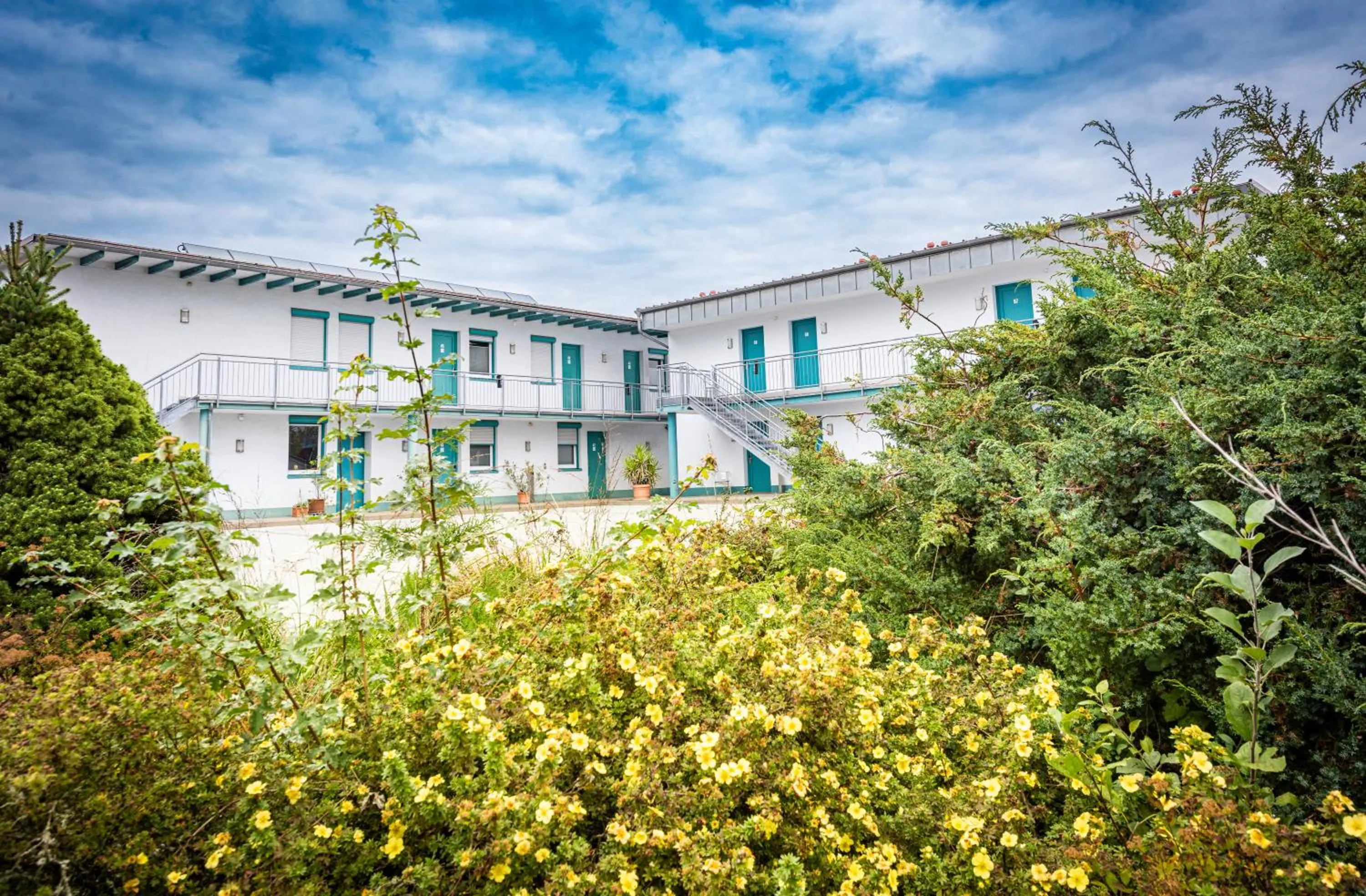 Property building in Hotel Am Wiesenweg l 24h check-in