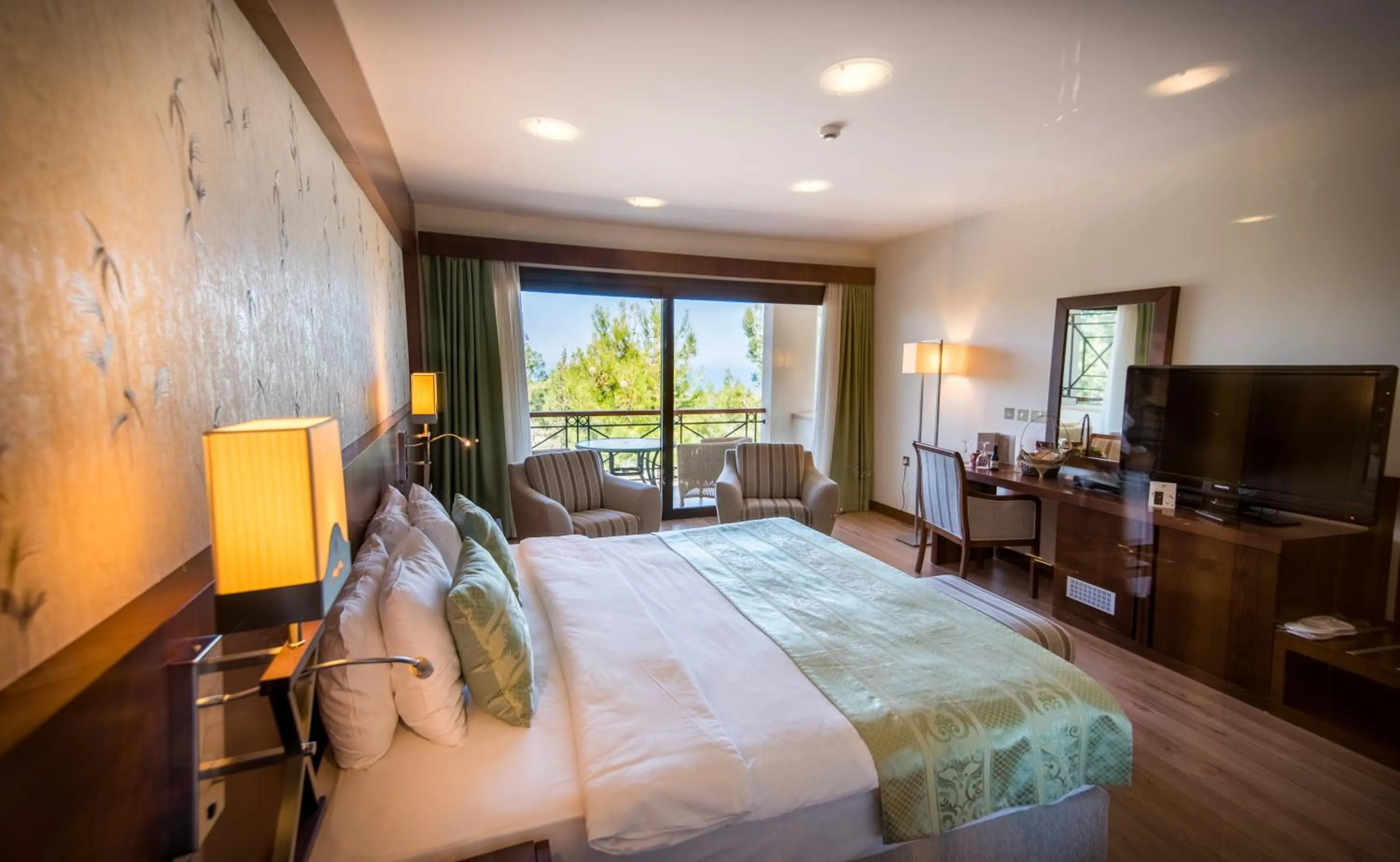 Communal lounge/ TV room, Bed in Korineum Golf & Beach Resort