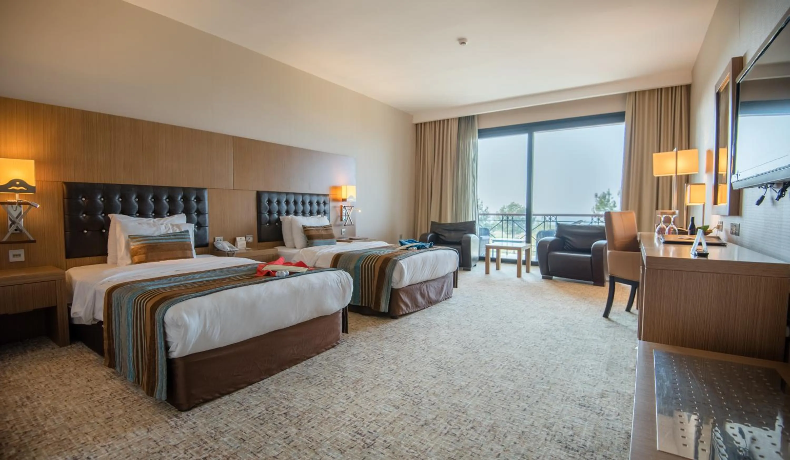 Bed in Korineum Golf & Beach Resort