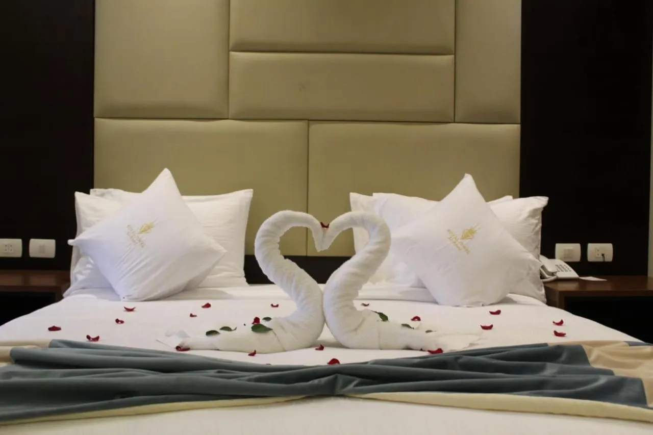 Bed in Royal Jewel Al Raml Hotel