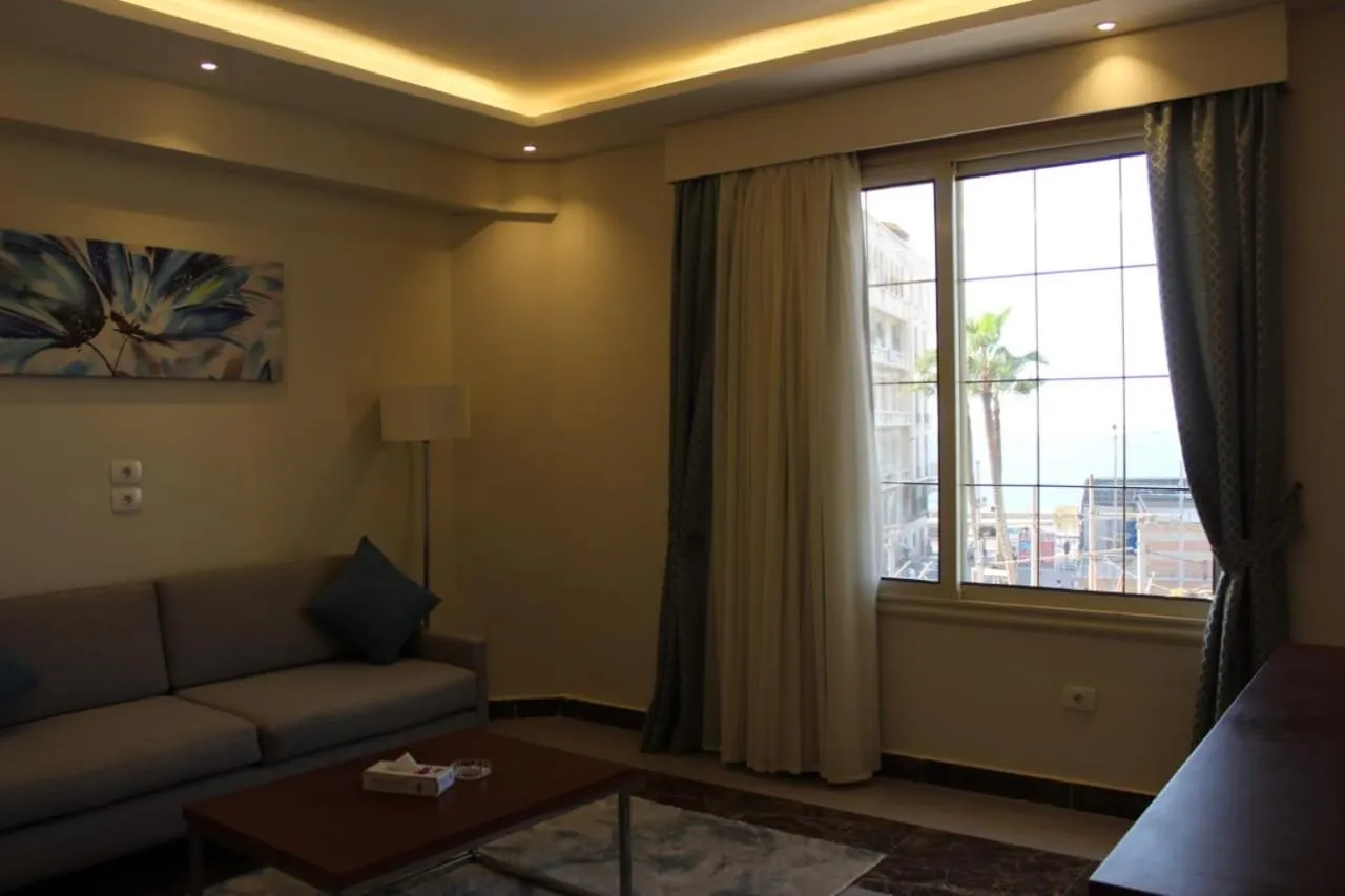 Living room in Royal Jewel Al Raml Hotel