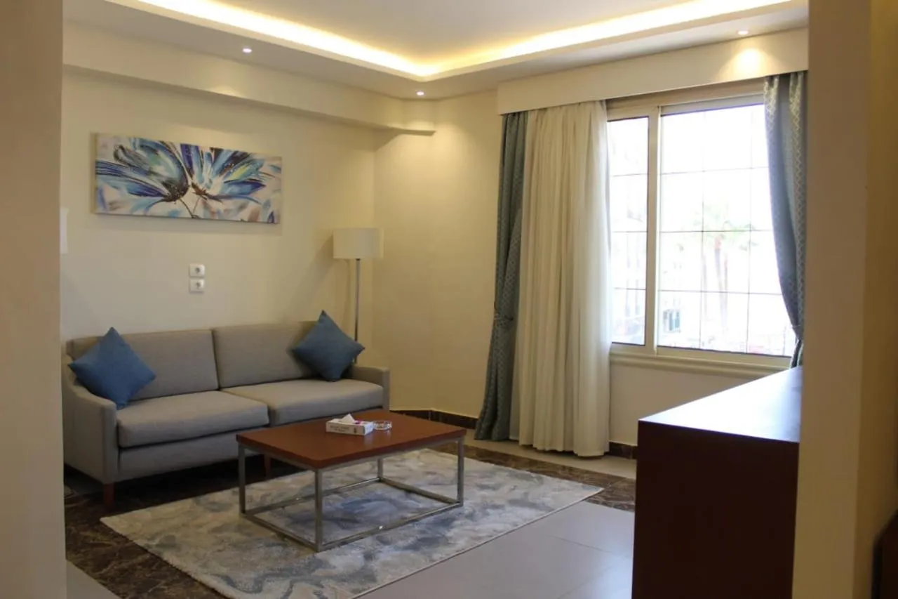 Living room in Royal Jewel Al Raml Hotel