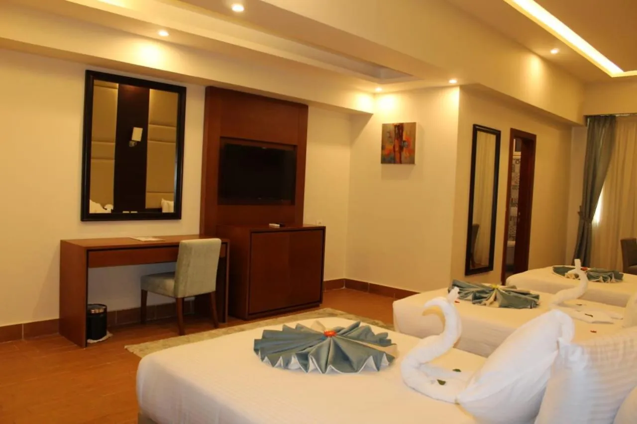 Bedroom in Royal Jewel Al Raml Hotel