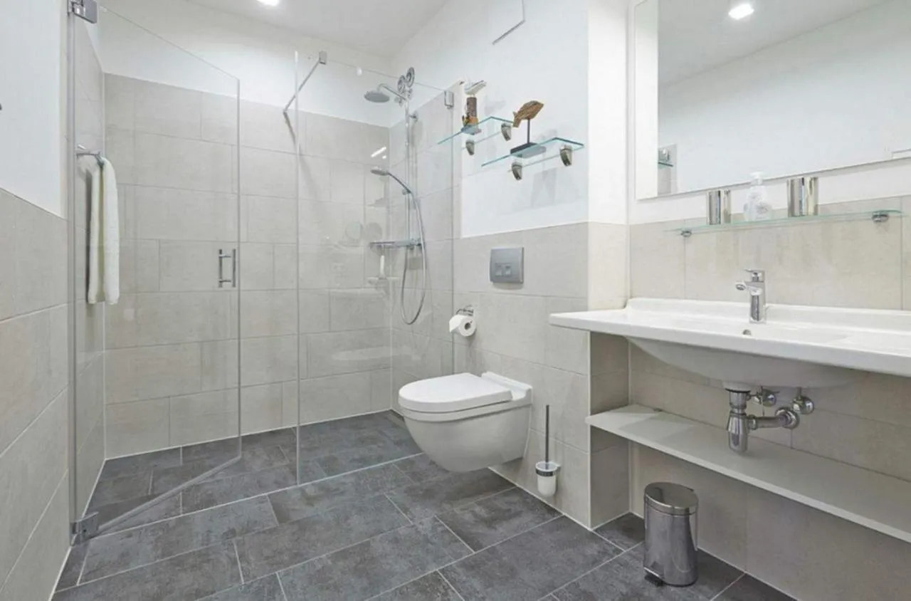 Bathroom in Aparthotel Waterkant Suites - Fewos am Meer mit SPA