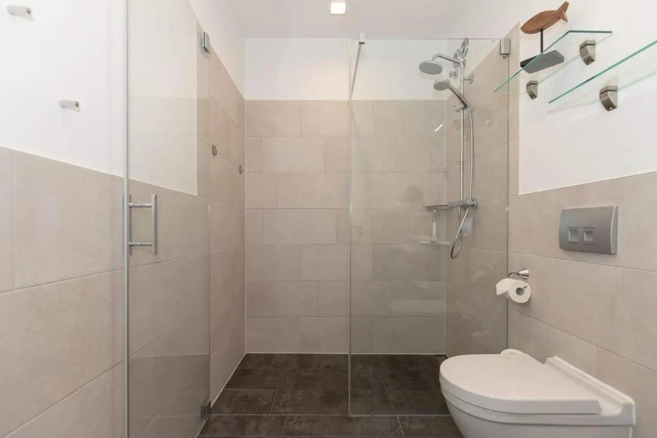 Bathroom in Aparthotel Waterkant Suites - Fewos am Meer mit SPA