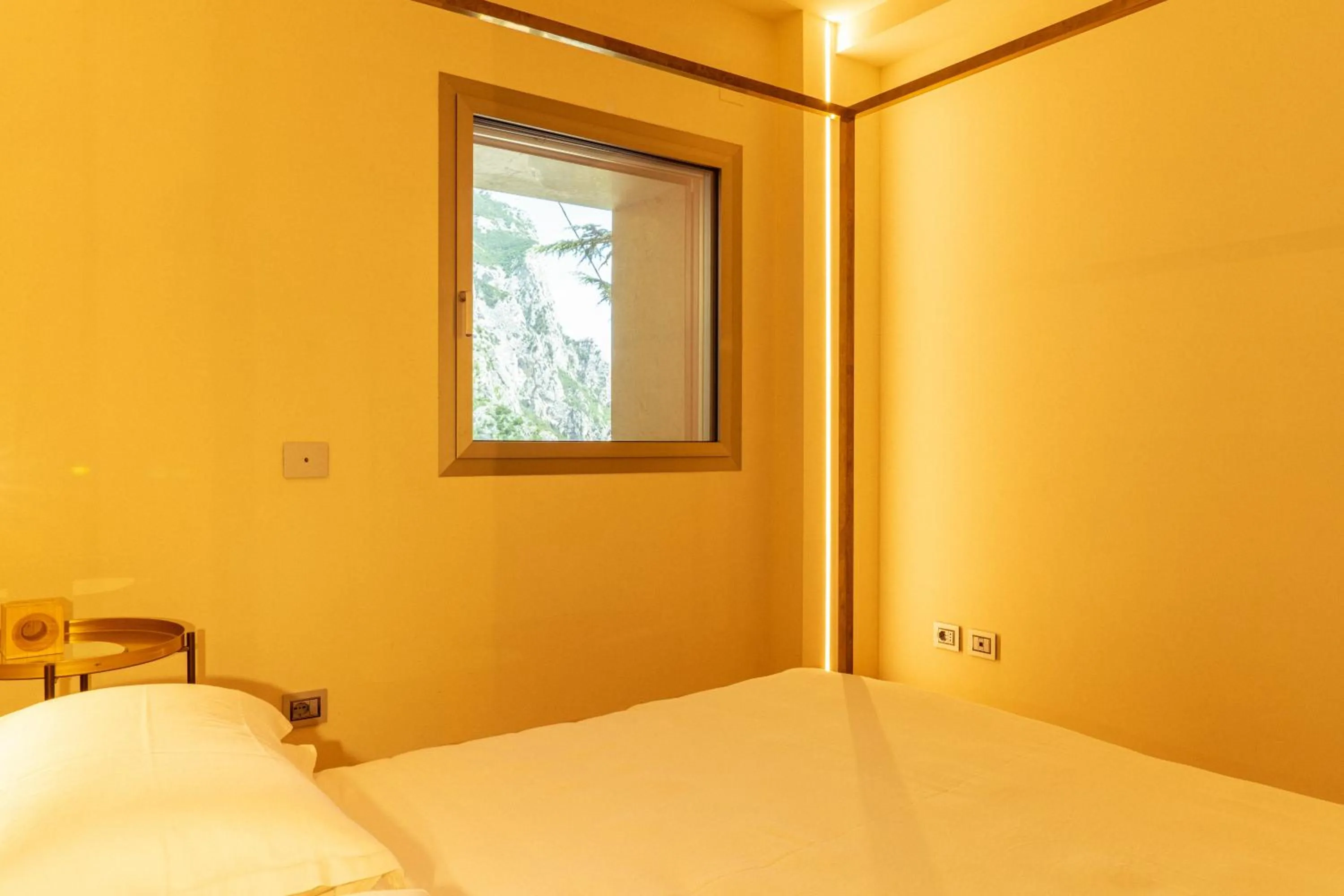 Bed in La Forestale Luxury Ecolodge B&B Primo Piano