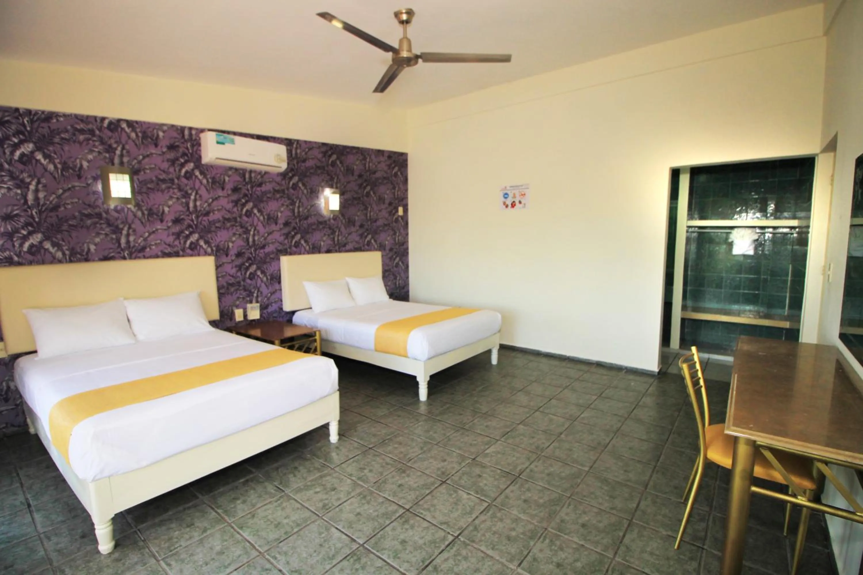 Quadruple Room in Hotel Gran Palmeiras