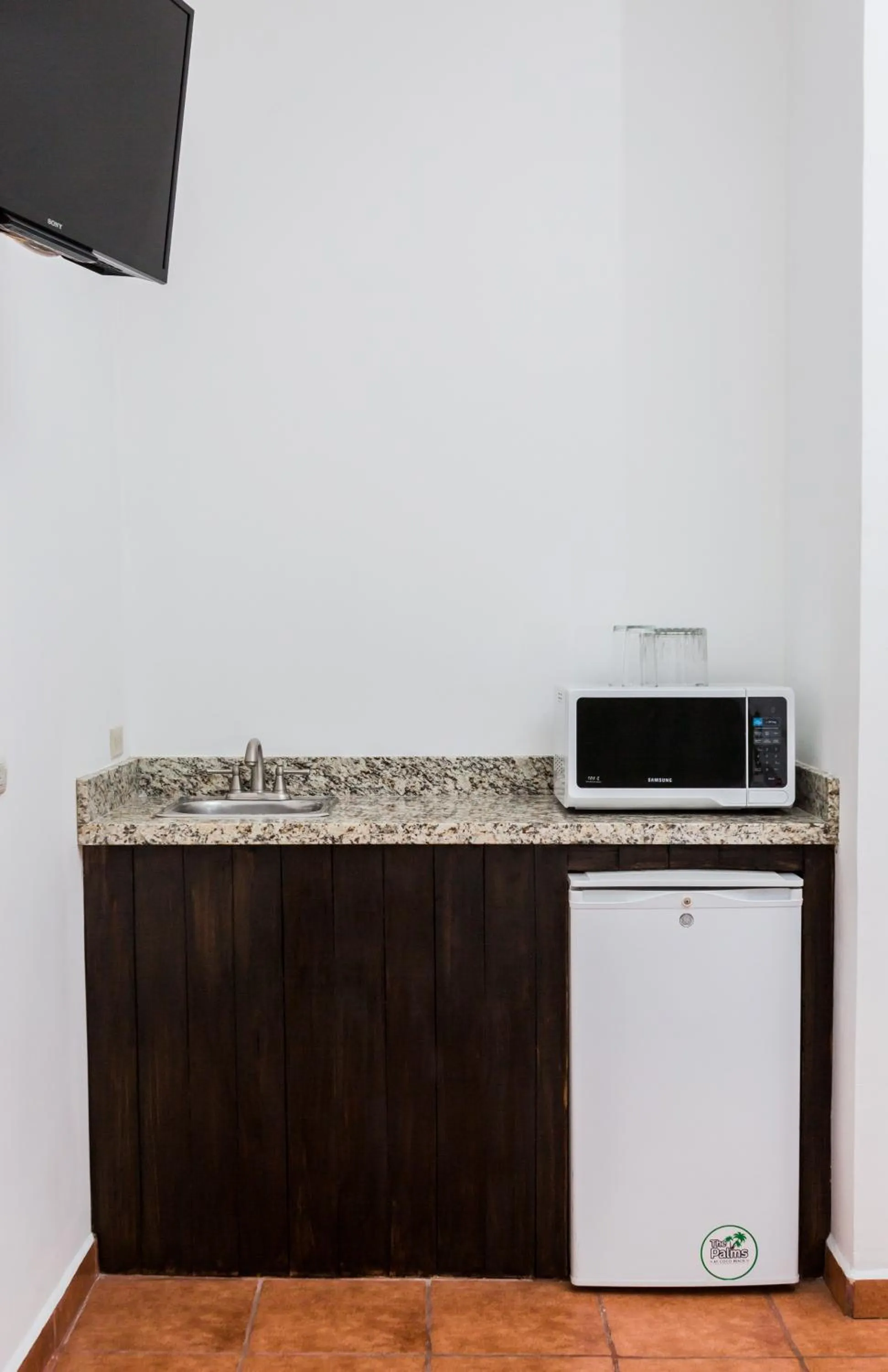 Kitchen or kitchenette in The Palms At Coco Beach