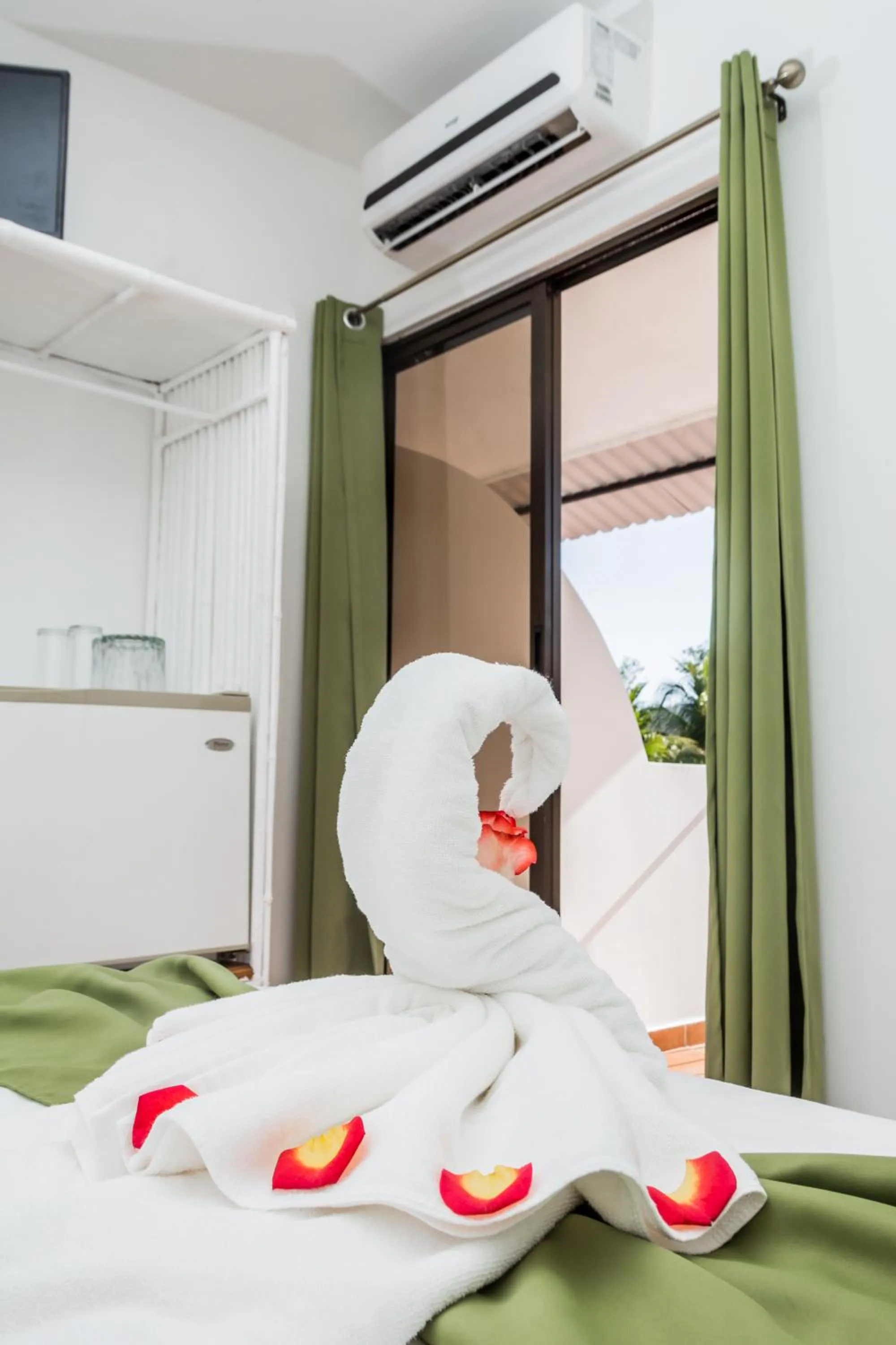 View (from property/room), Bed in The Palms At Coco Beach