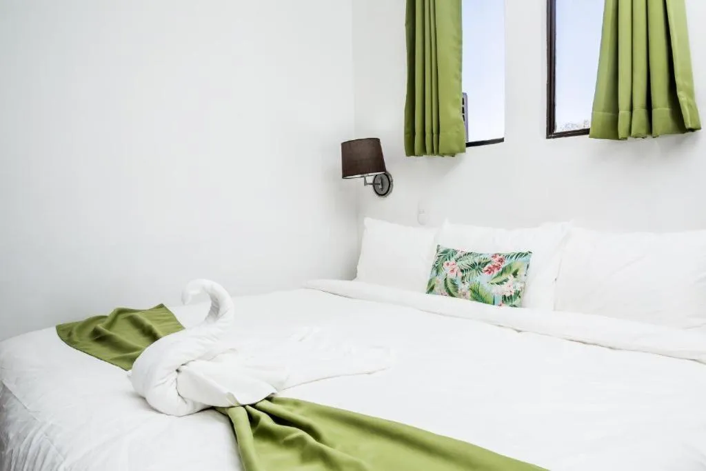 Bed in The Palms At Coco Beach