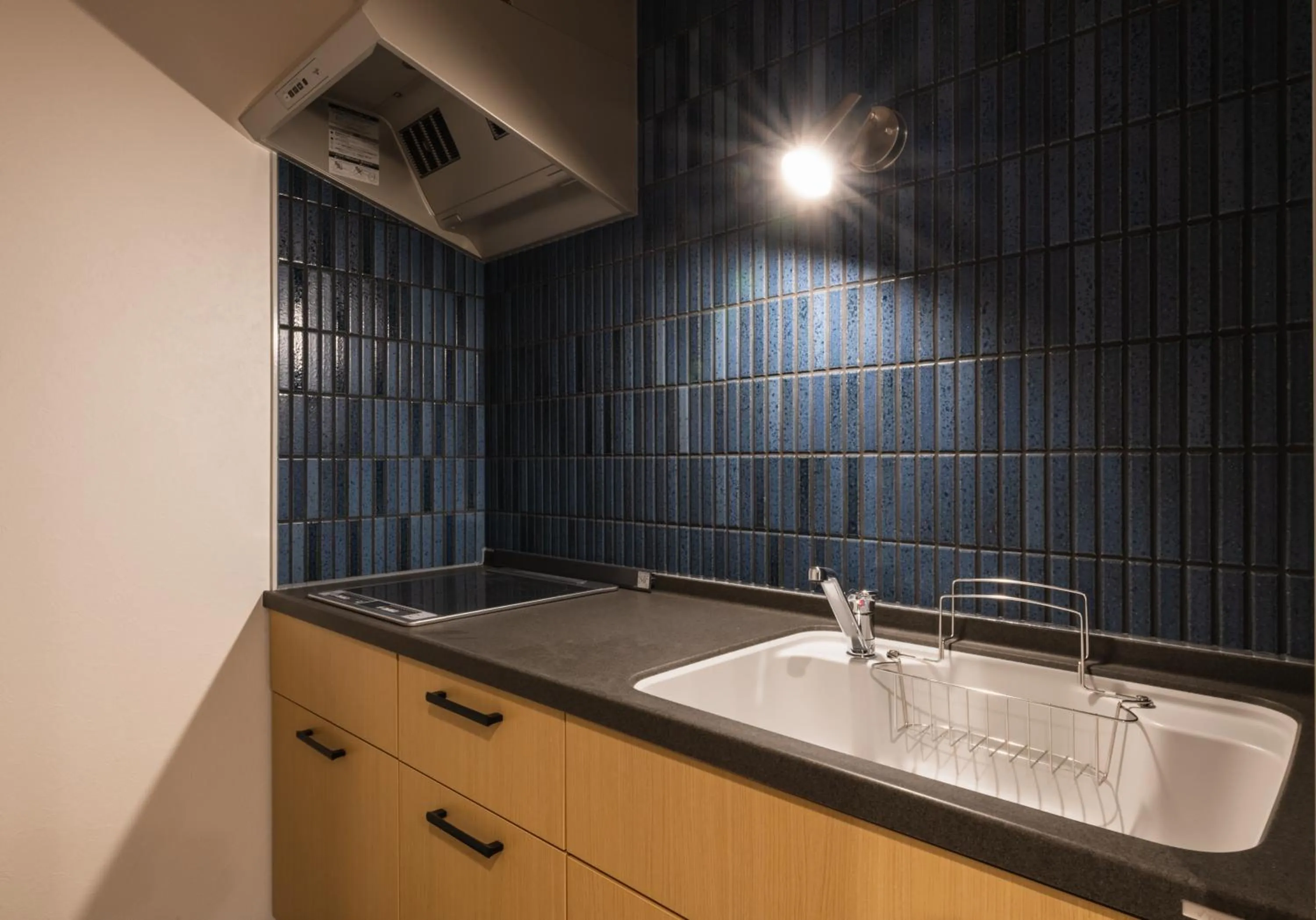 Kitchen or kitchenette in J-STAY Beppu indigo