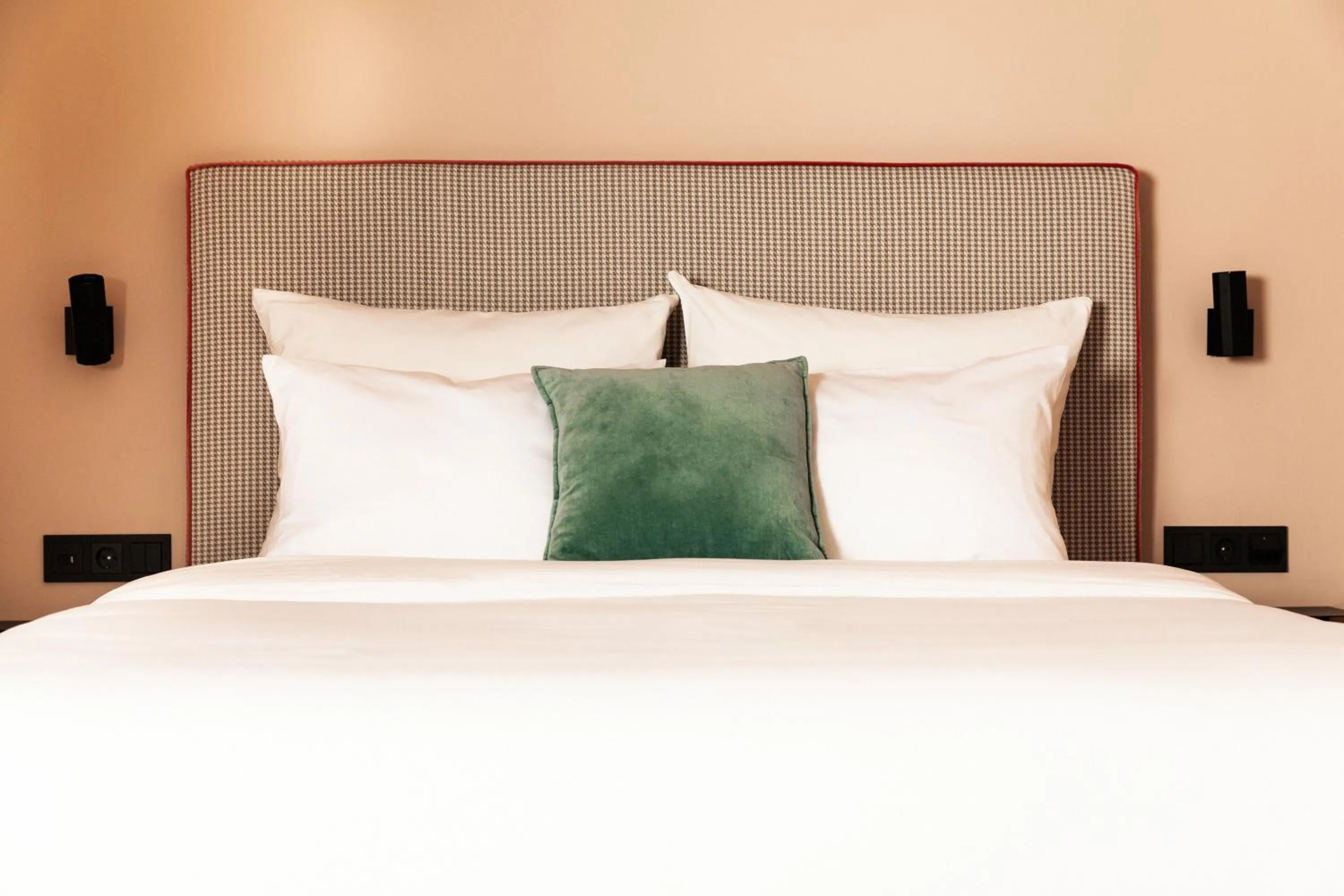 Bed in MIANO Hotel & Bar