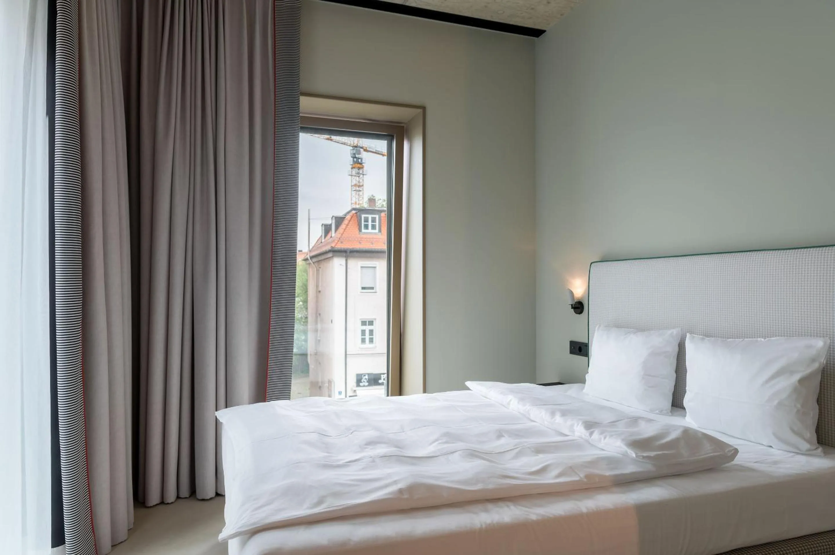 Bed in Hotel Miano by Limehome