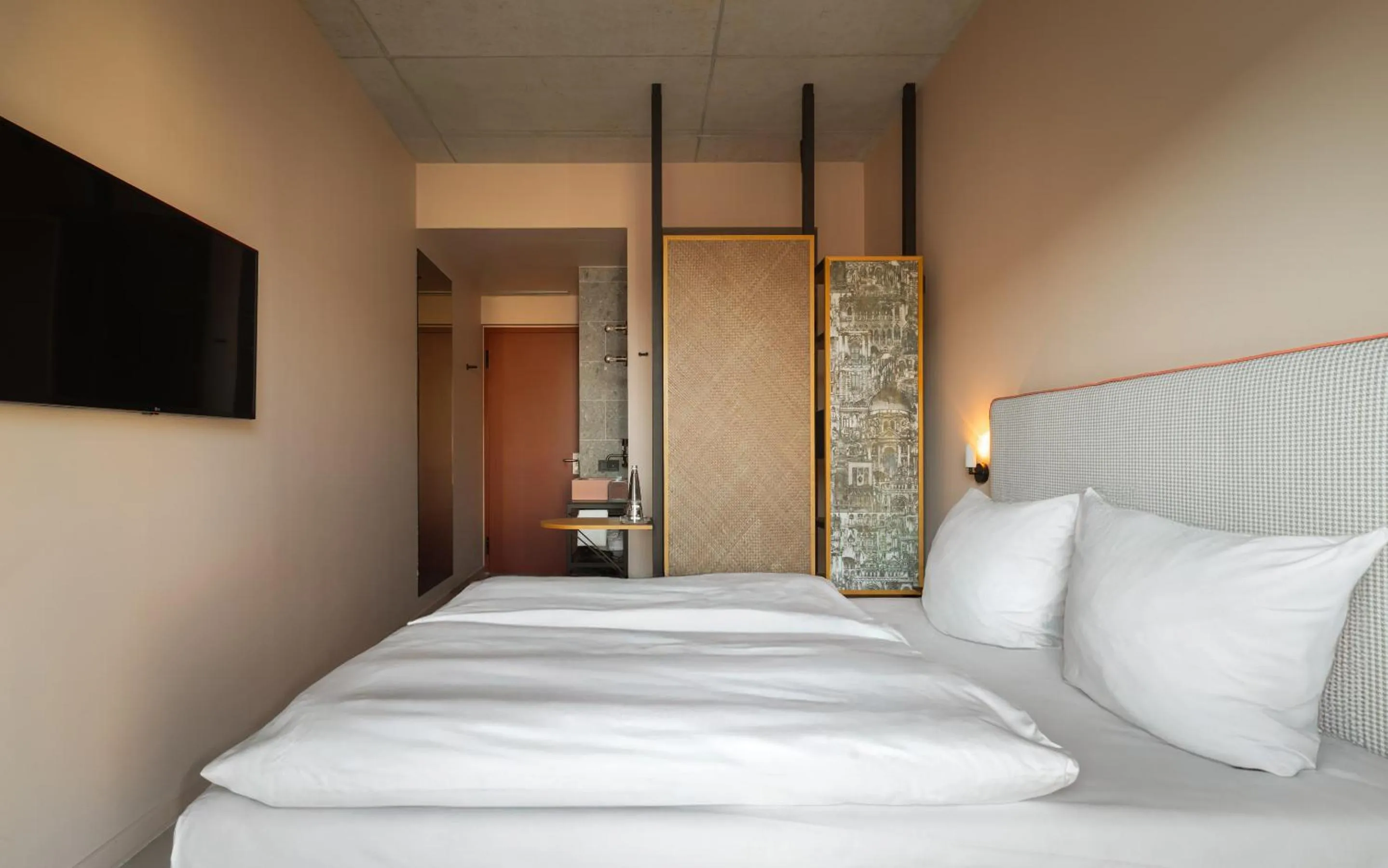 Bed in Hotel Miano by Limehome