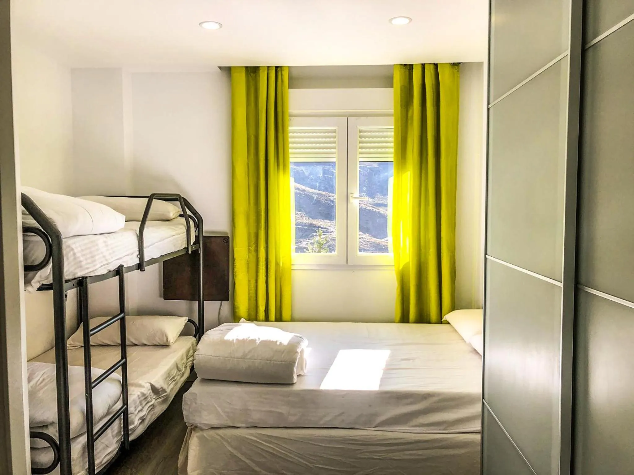 Bed in Apartamentos Sierra Nevada Prime Bluettravel