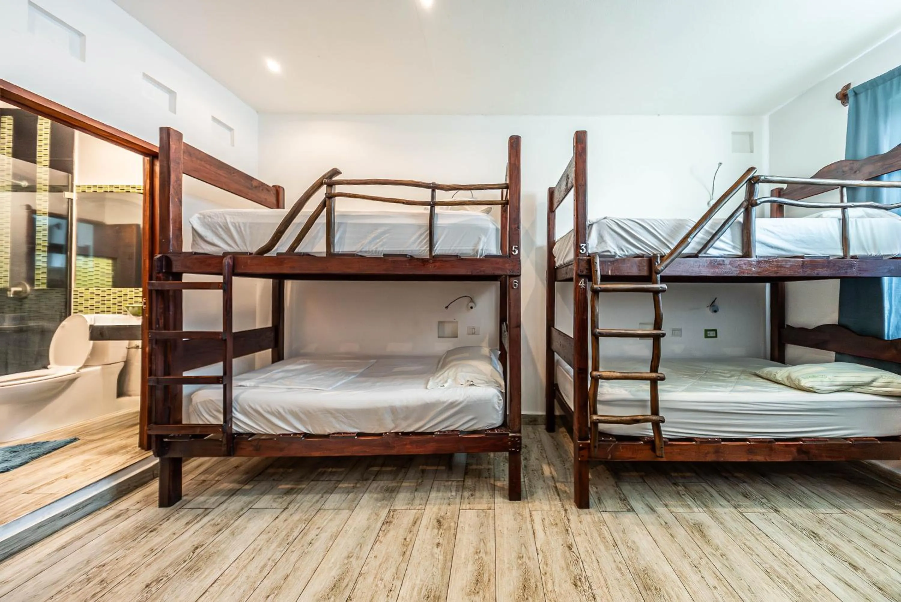 Bed in The Green Village Boutique Hotel