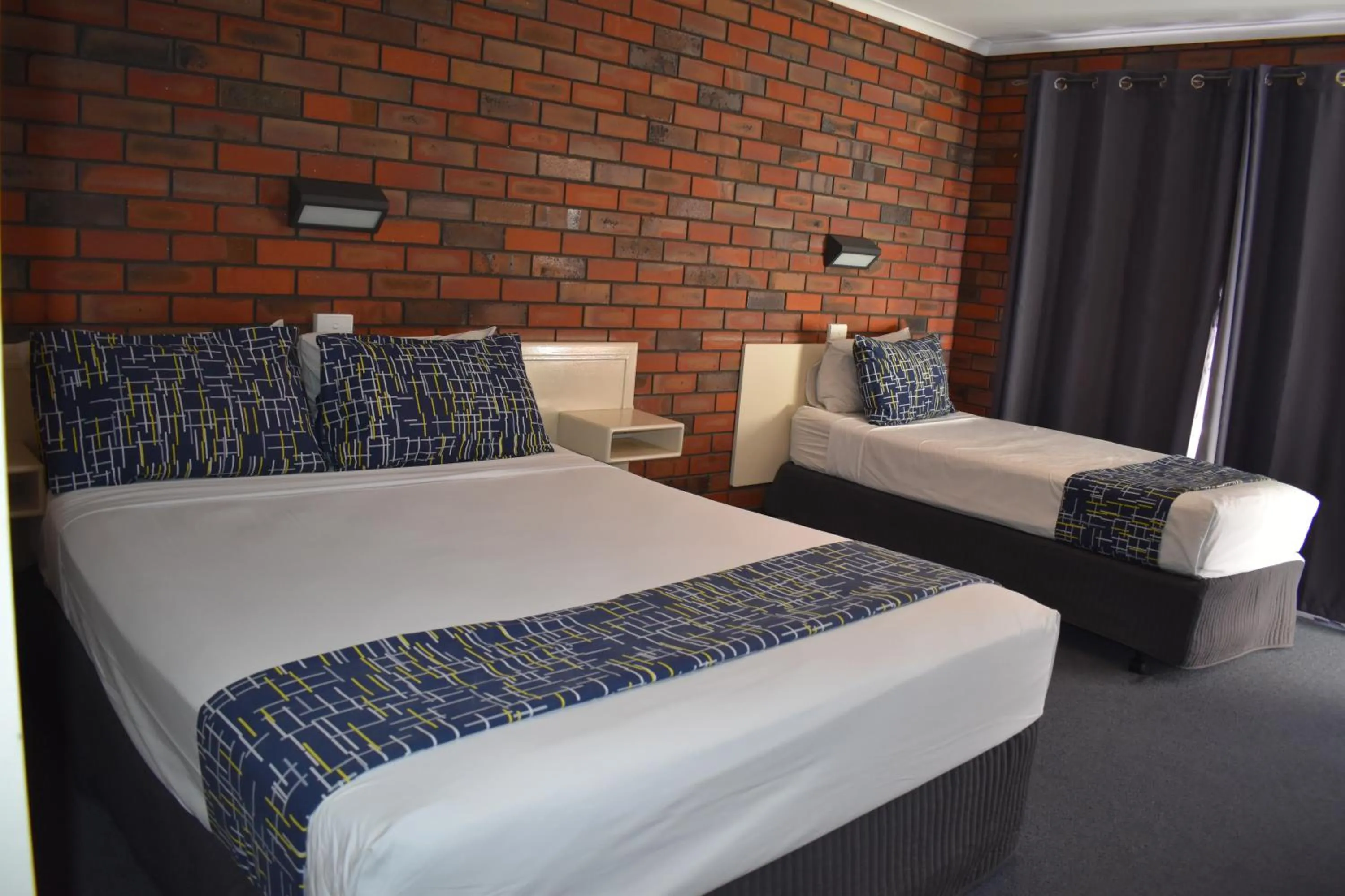 Bed in Coorrabin Motor Inn