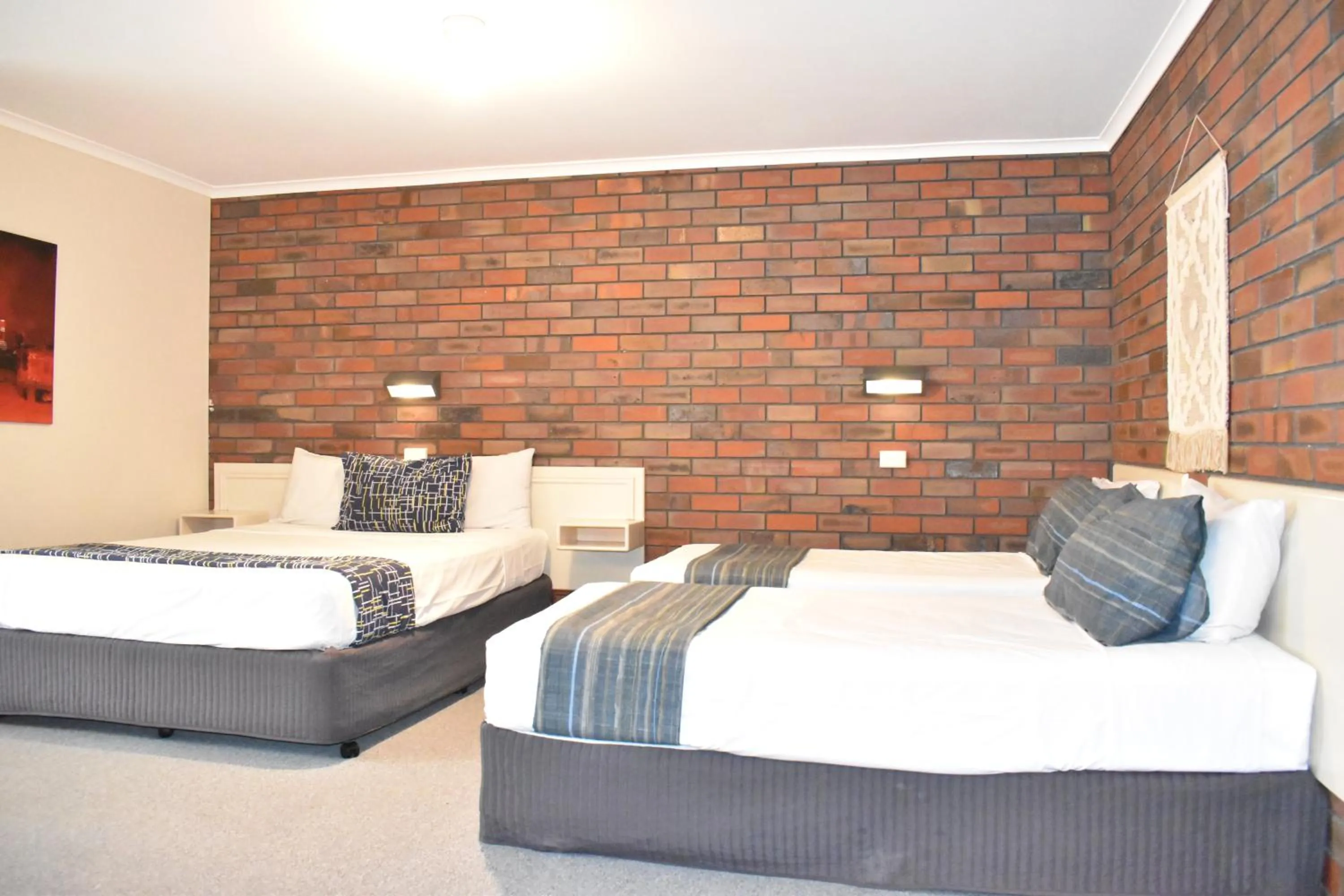 Bed in Coorrabin Motor Inn