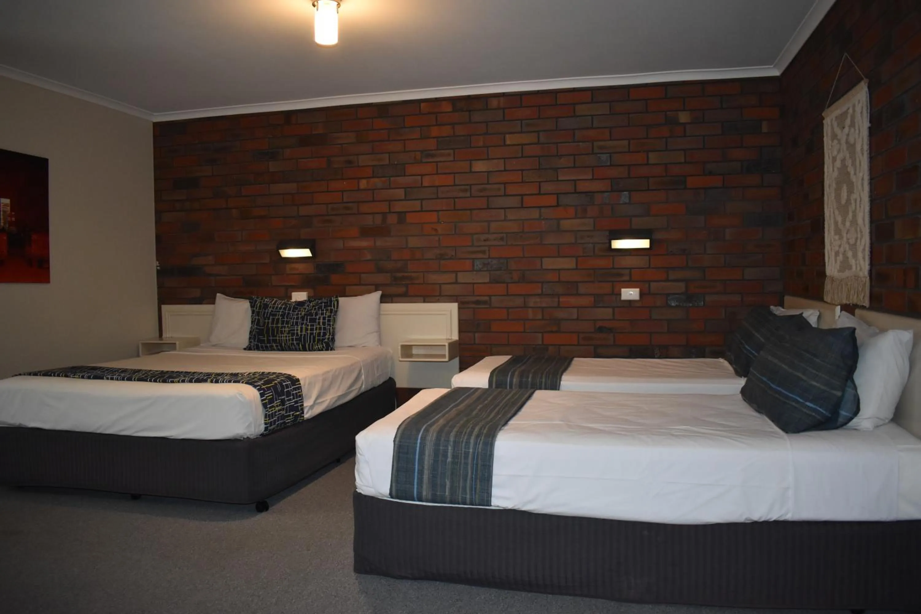 Bed in Coorrabin Motor Inn