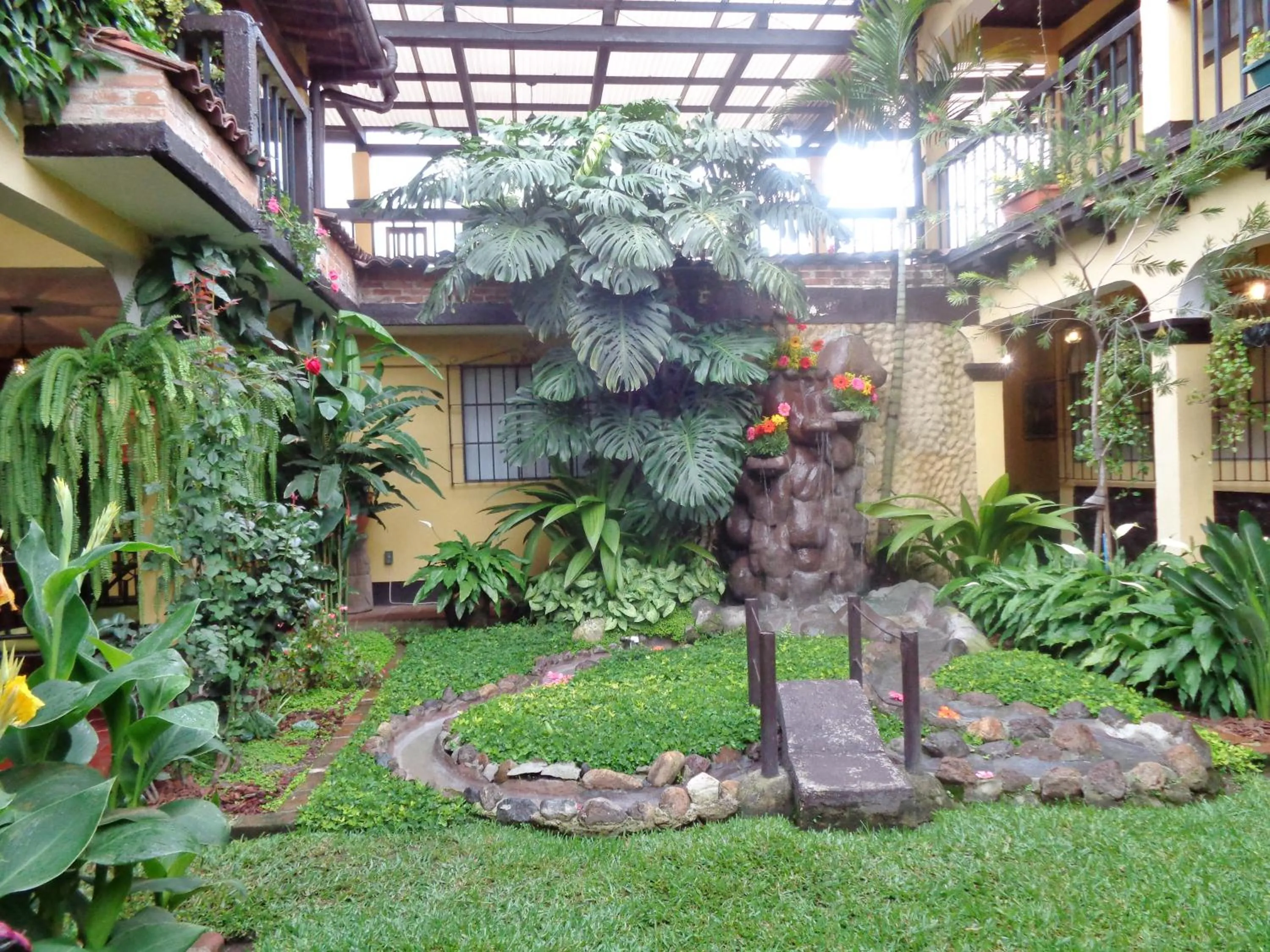 Garden in Hotel Las Camelias Inn by AHS