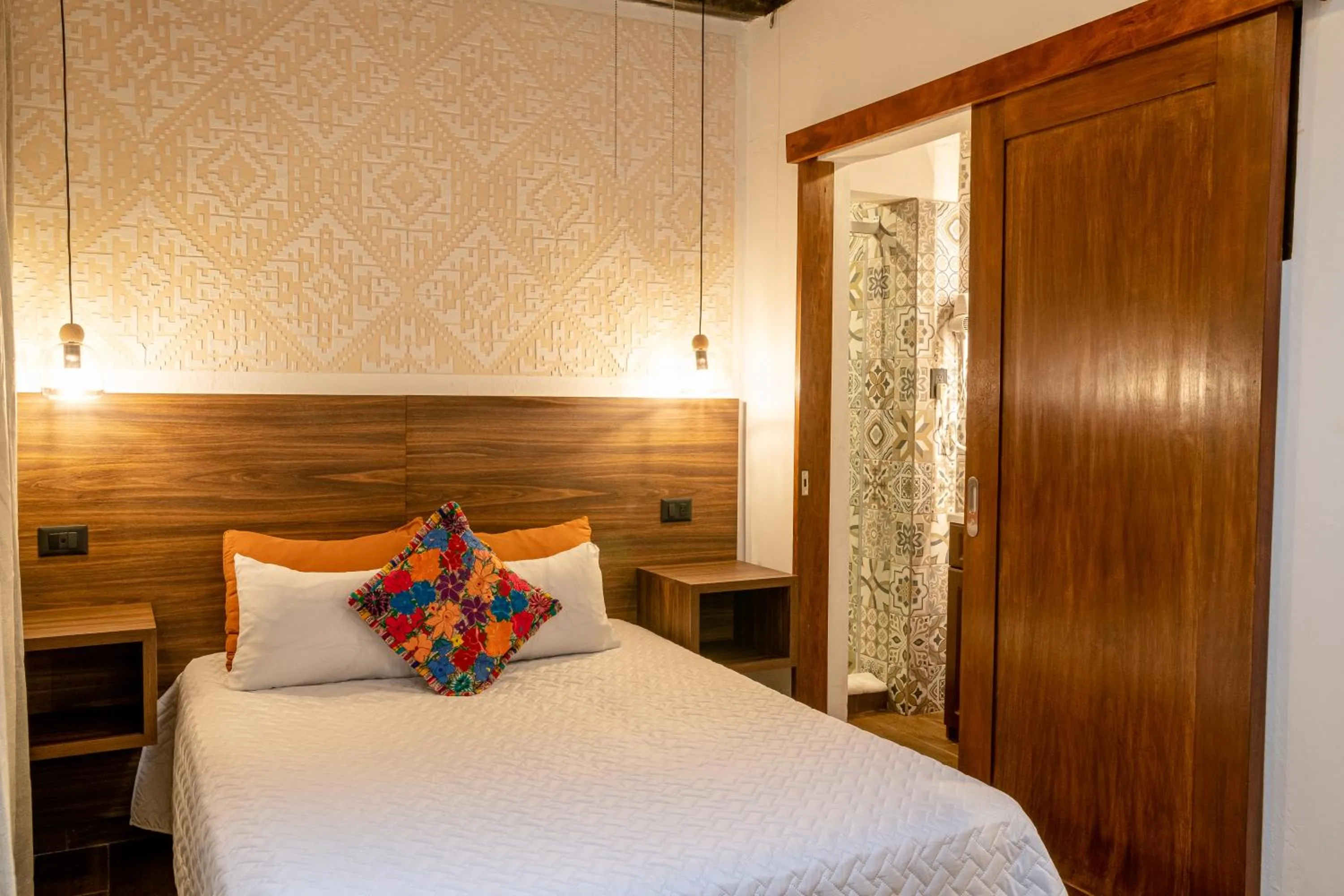 Bed in Hotel Las Camelias Inn by AHS