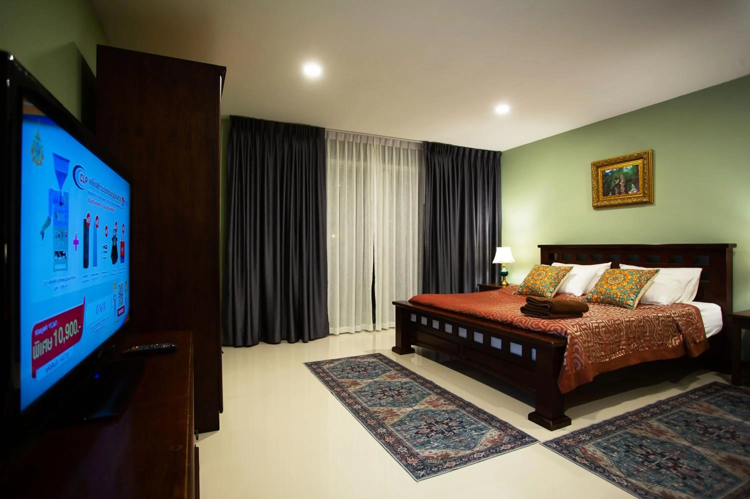 Bed in Nagawari Art Maldives BBQ Pattaya Villa