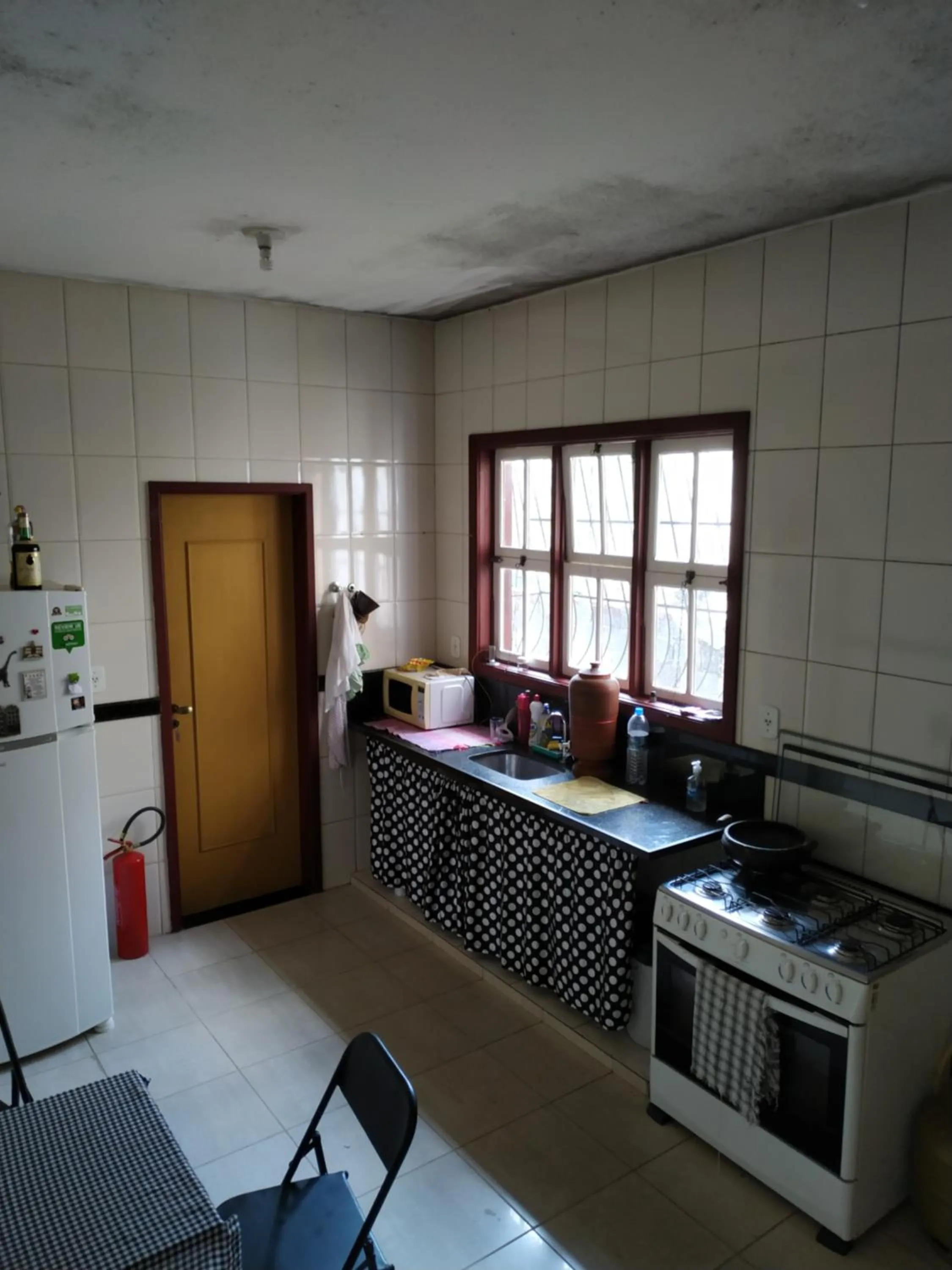 Communal kitchen in Trilhas de Minas Hostel Camping