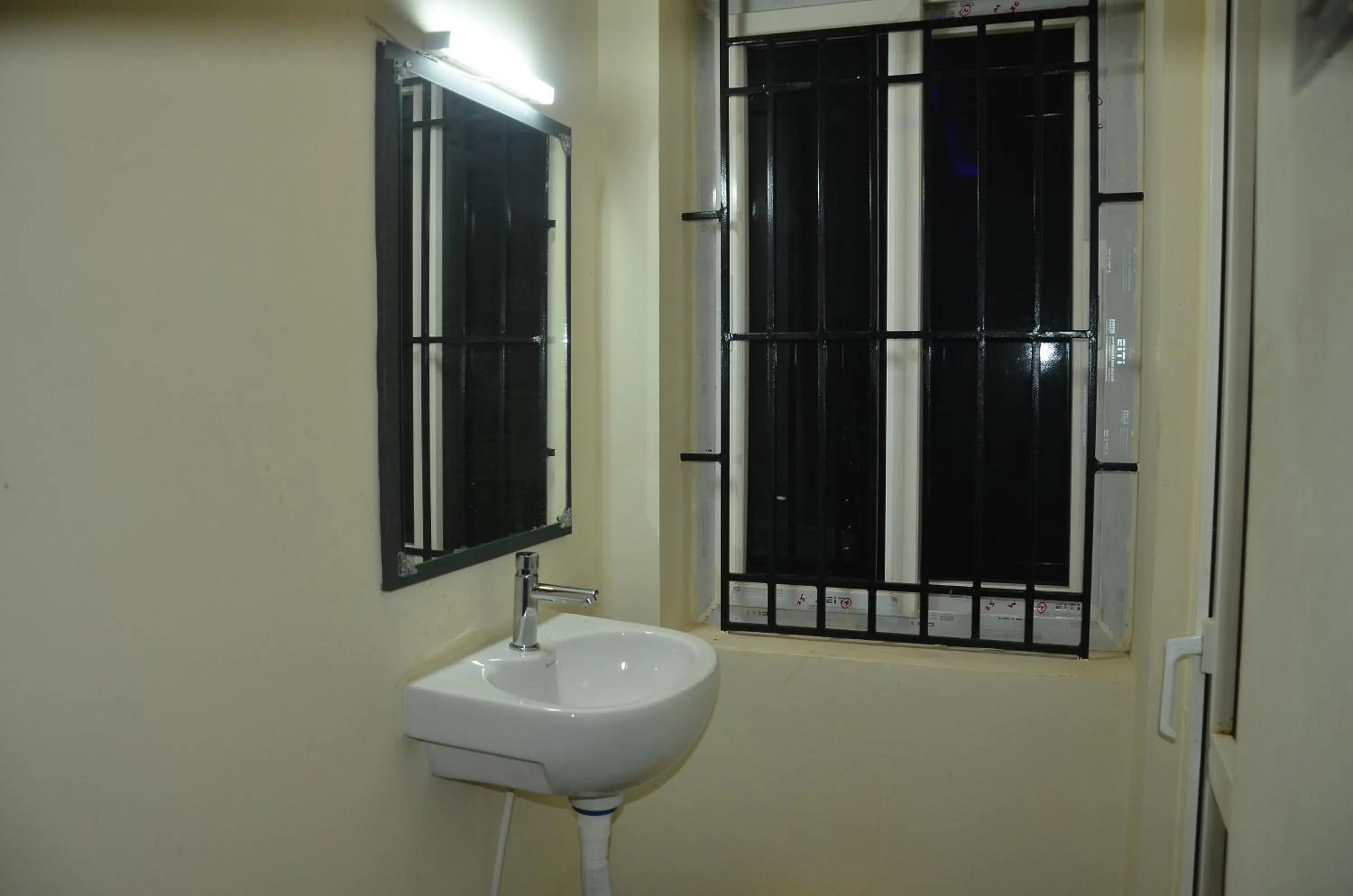 Bathroom in HOTEL PANCHAVARNAA