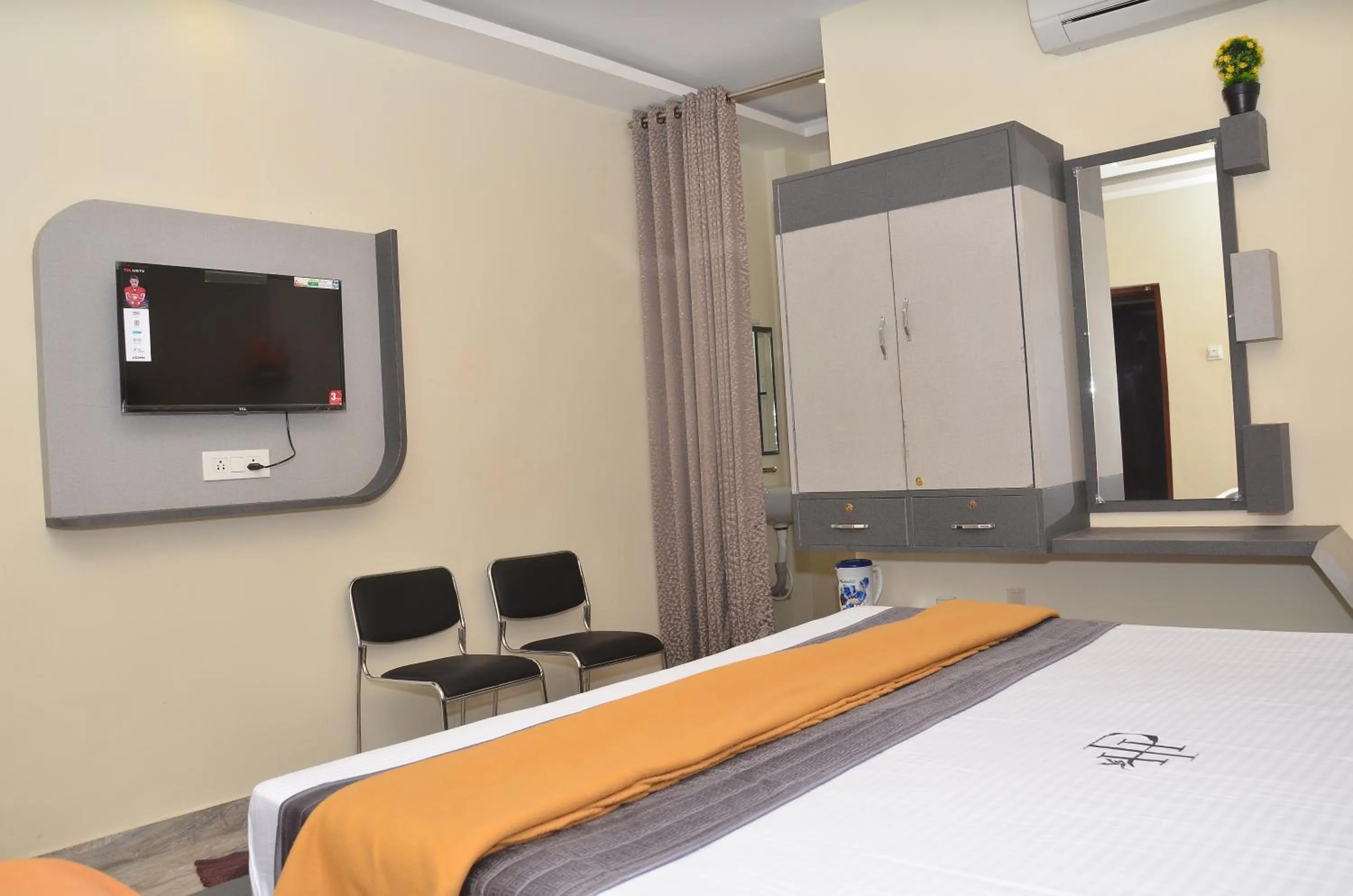 Bed in HOTEL PANCHAVARNAA